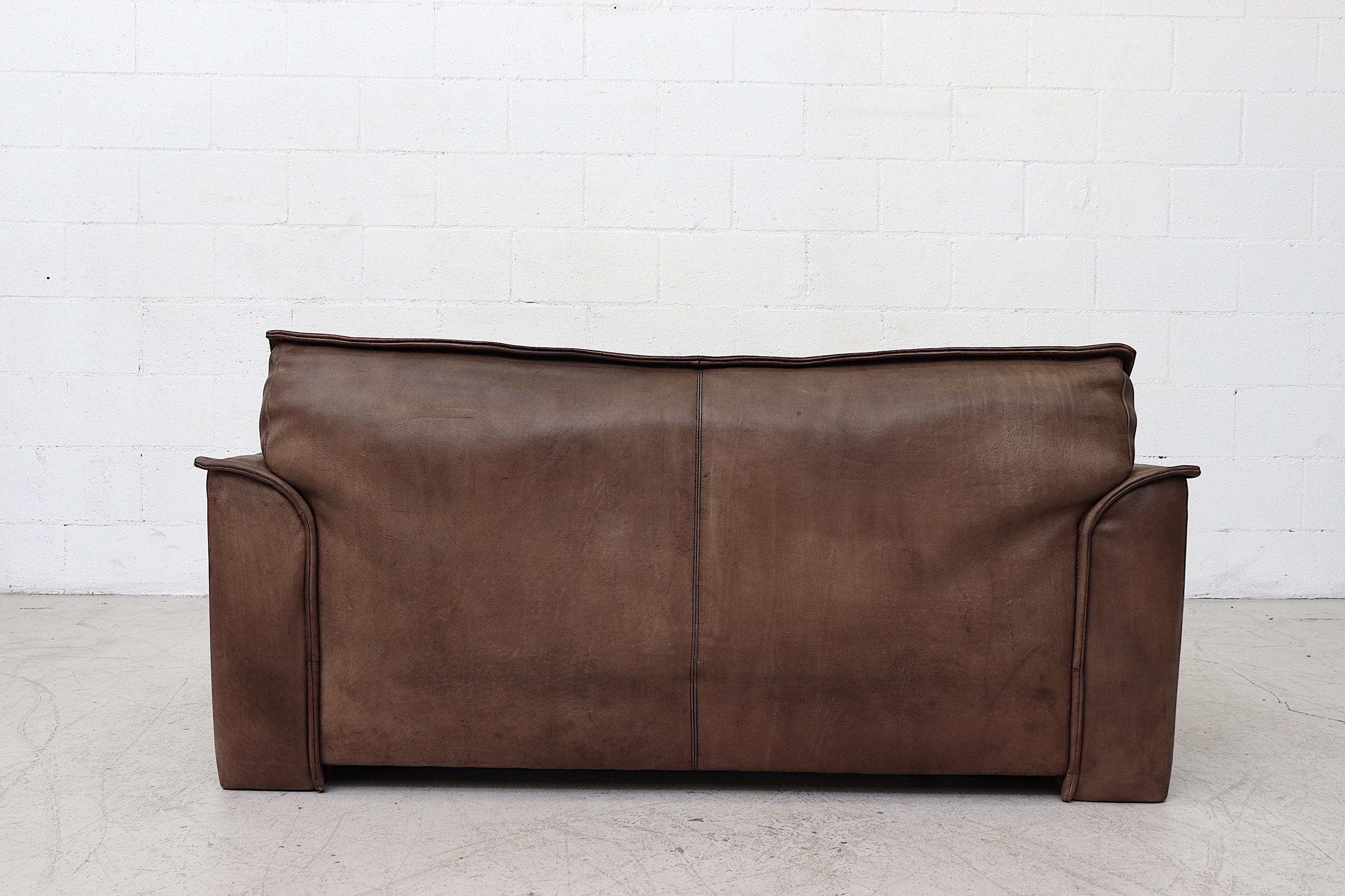 Late 20th Century Well worn Leolux Buffalo Leather Love Seat