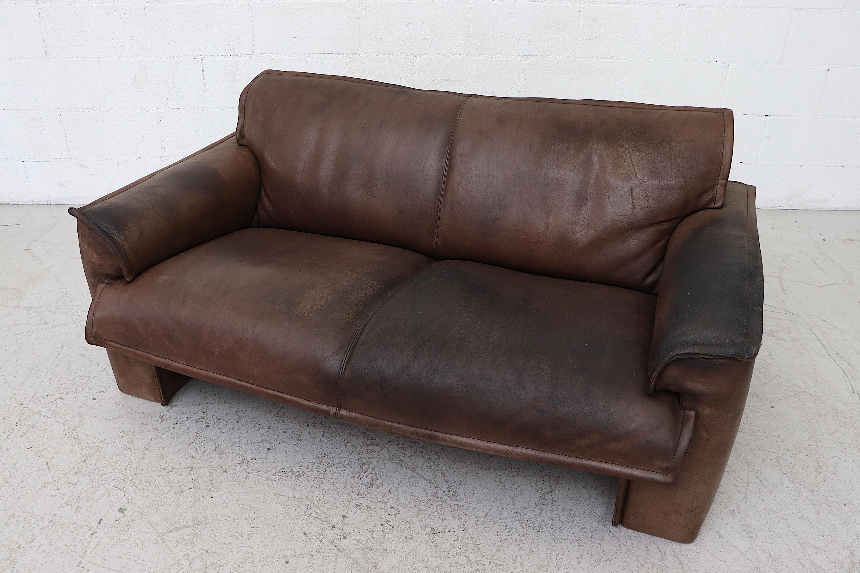 Well worn Leolux Buffalo Leather Love Seat 1
