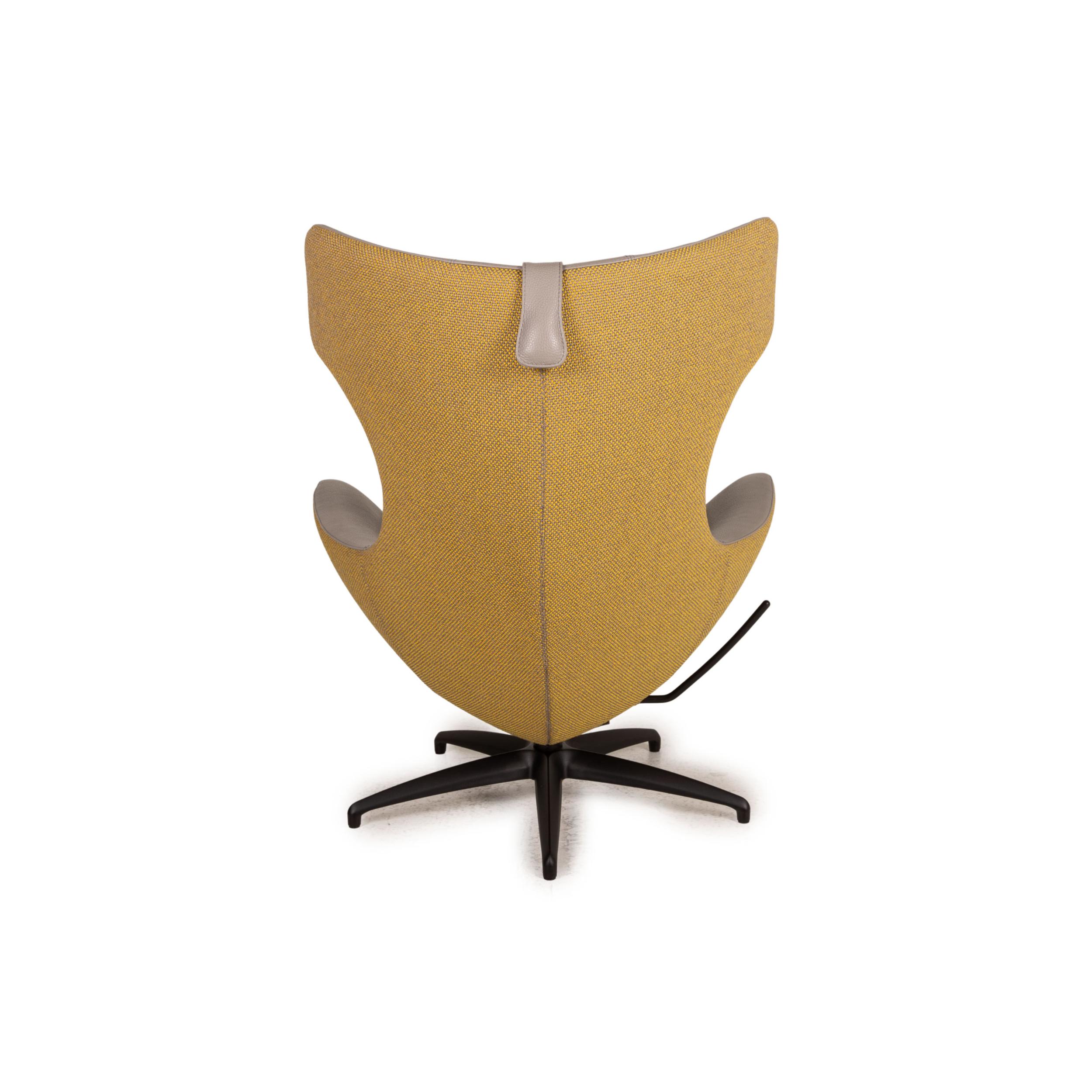 Leolux Caruzzo Plus leather armchair gray incl. Stool 1