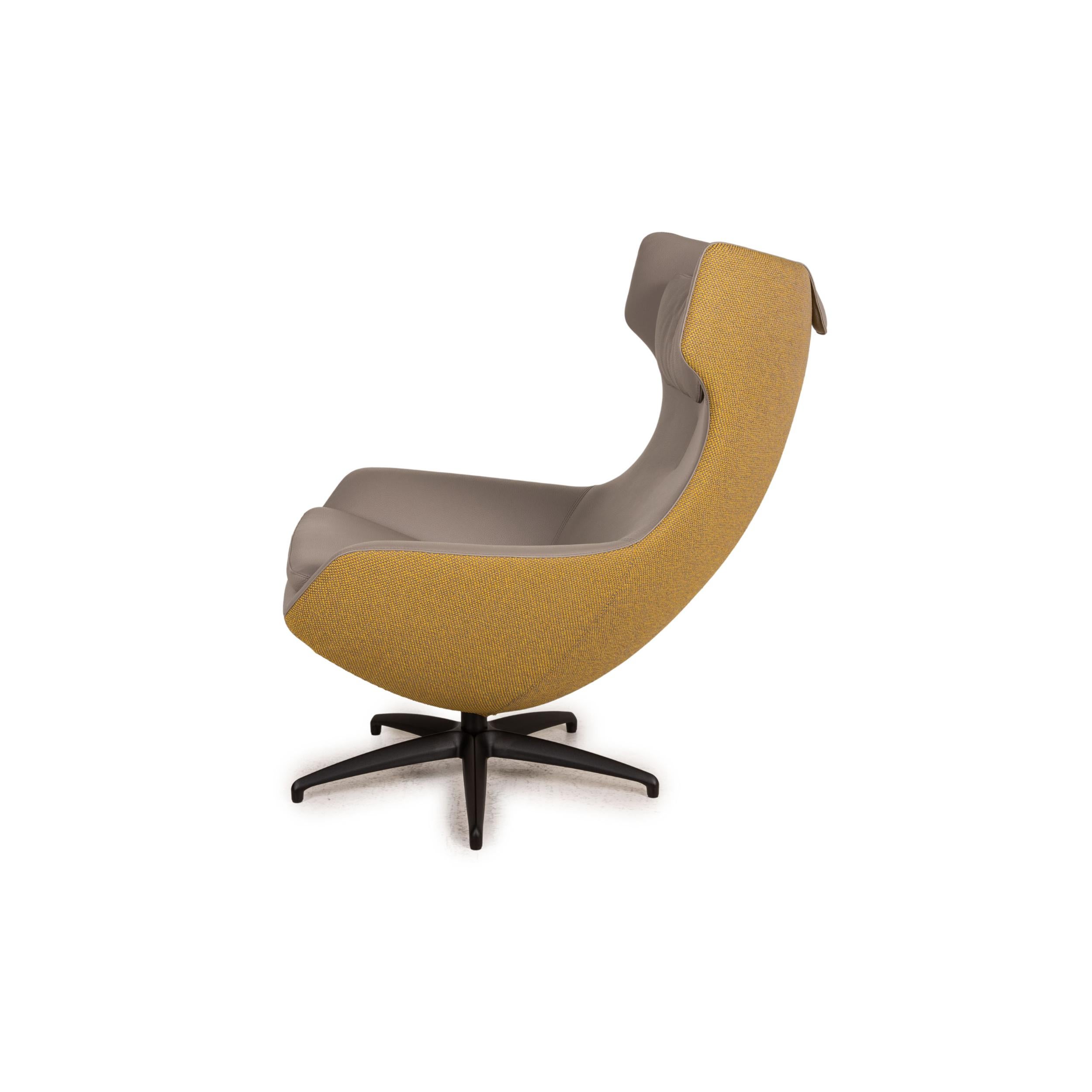 Leolux Caruzzo Plus leather armchair gray incl. Stool 2