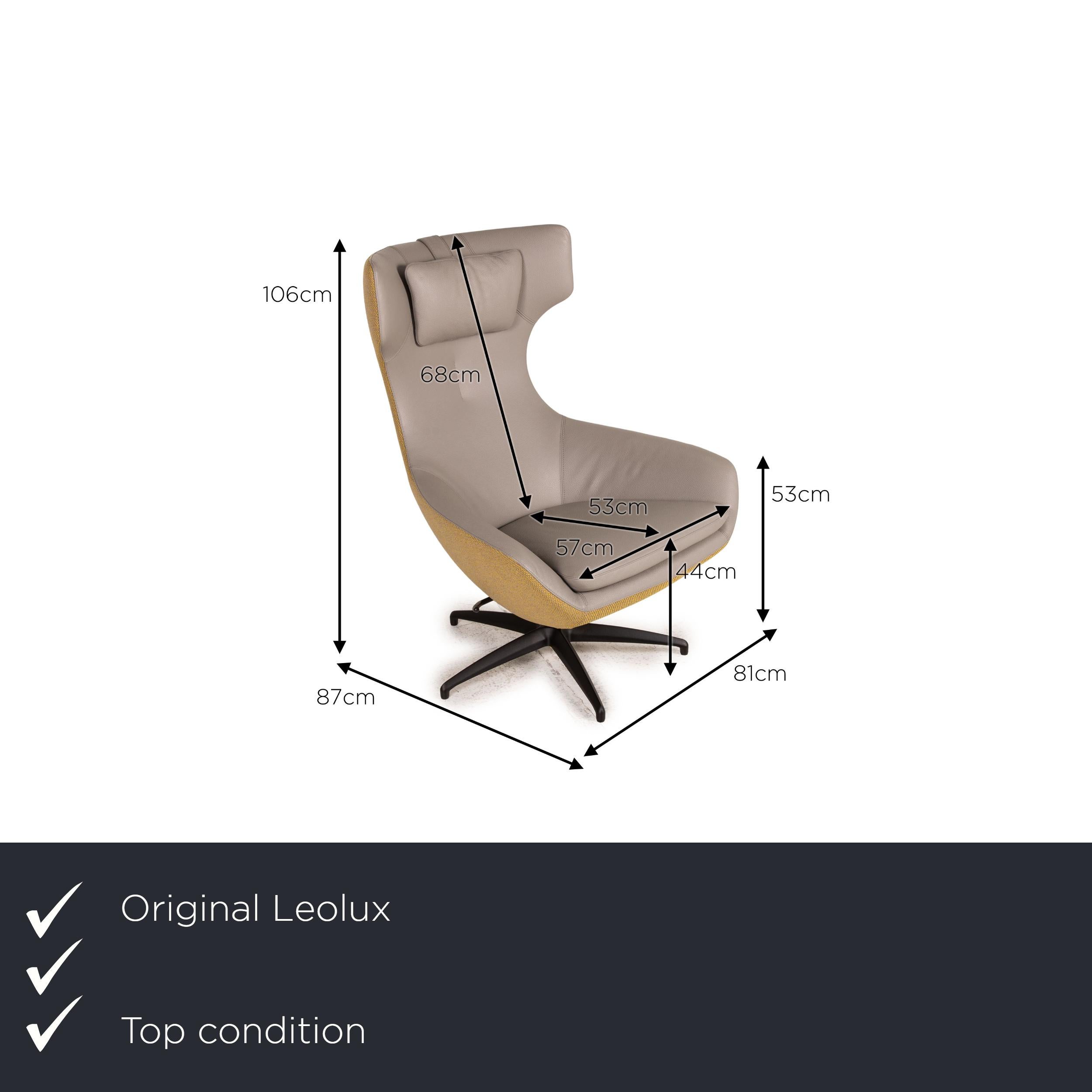We present to you a Leolux Caruzzo Plus leather armchair gray incl. Stool.
 SKU: #16886-c4
 

 Product measurements in centimeters:
 

 depth: 87
 width: 81
 height: 106
 seat height: 44
 rest height: 53
 seat depth: 53
 seat width: