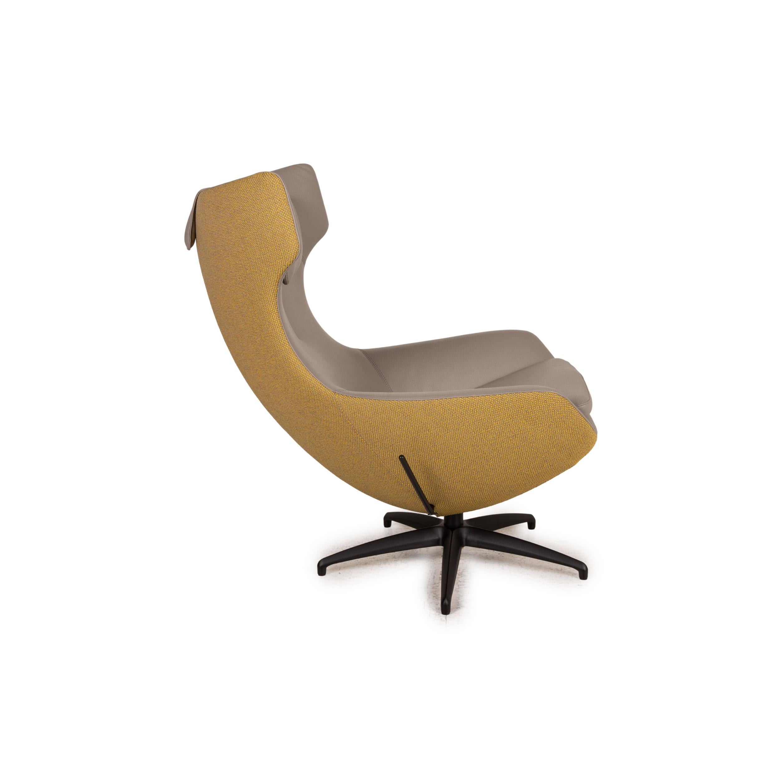 Leather Leolux Caruzzo Plus leather armchair gray incl. Stool