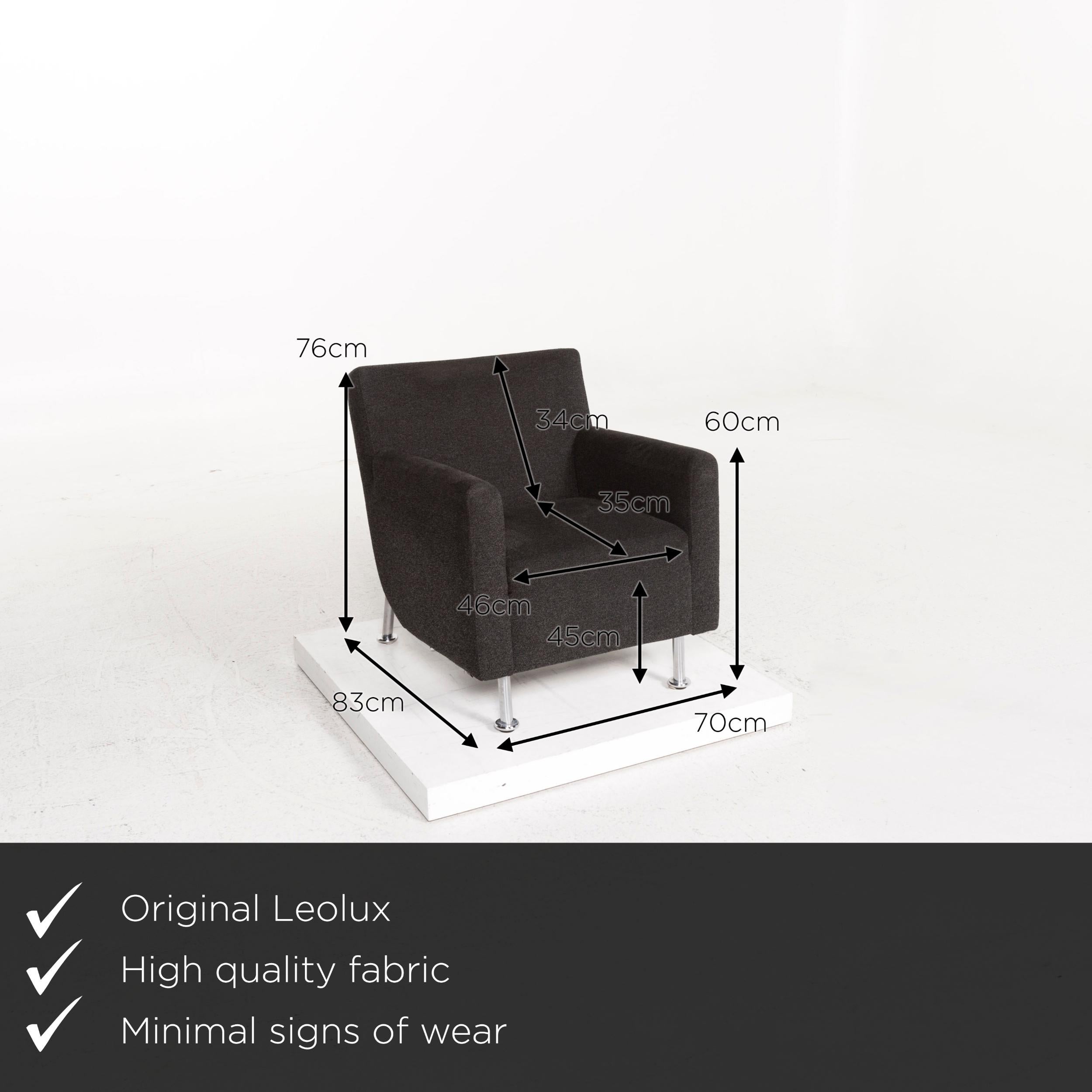 We present to you a Leolux fabric armchair black.
 

 Product measurements in centimeters:
 

Depth 83
Width 70
Height 76
Seat height 45
Rest height 60
Seat depth 35
Seat width 46
Back height 34.

 