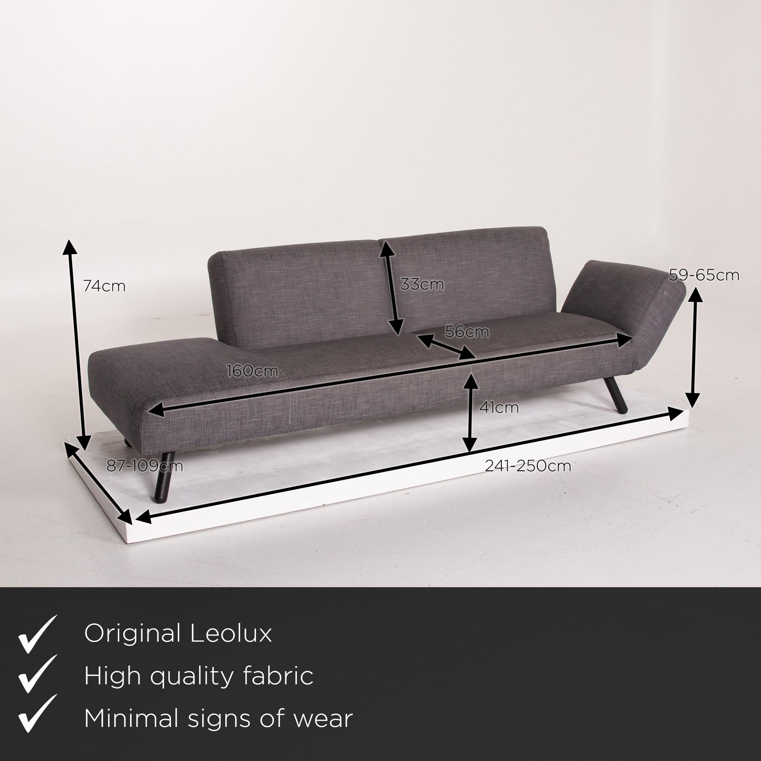 We present to you a Leolux fabric sofa gray three-seat.

 

 Product measurements in centimeters:
 

Depth 87
Width 241
Height 74
Seat height 41
Rest height 65
Seat depth 56
Seat width 160
Back height 33.
 