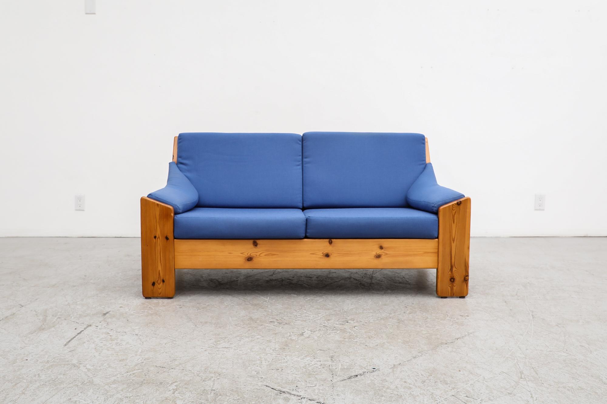 Dutch Mid Century Leolux loveseat sofas with original blue cushions and solid pine frames. In original condition with visible wear consistent with their age and use. Matching lounge chair available (LU922432259402) as well as a matching pine coffee