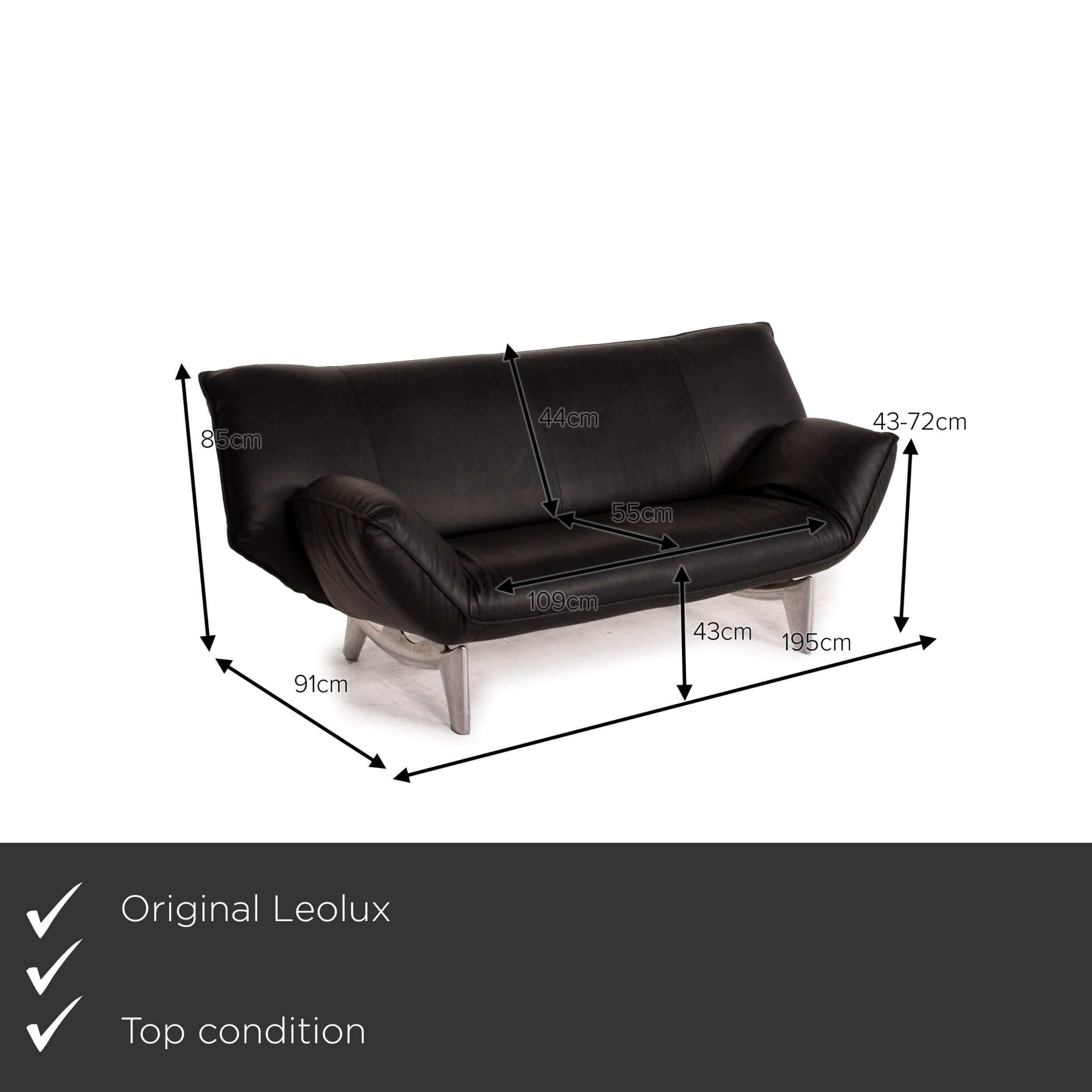 We present to you a Leolux Tango leather sofa black two-seater.


 Product measurements in centimeters:
 

Depth: 91
Width: 195
Height: 85
Seat height: 43
Rest height: 43
Seat depth: 55
Seat width: 109
Back height: 44.
 