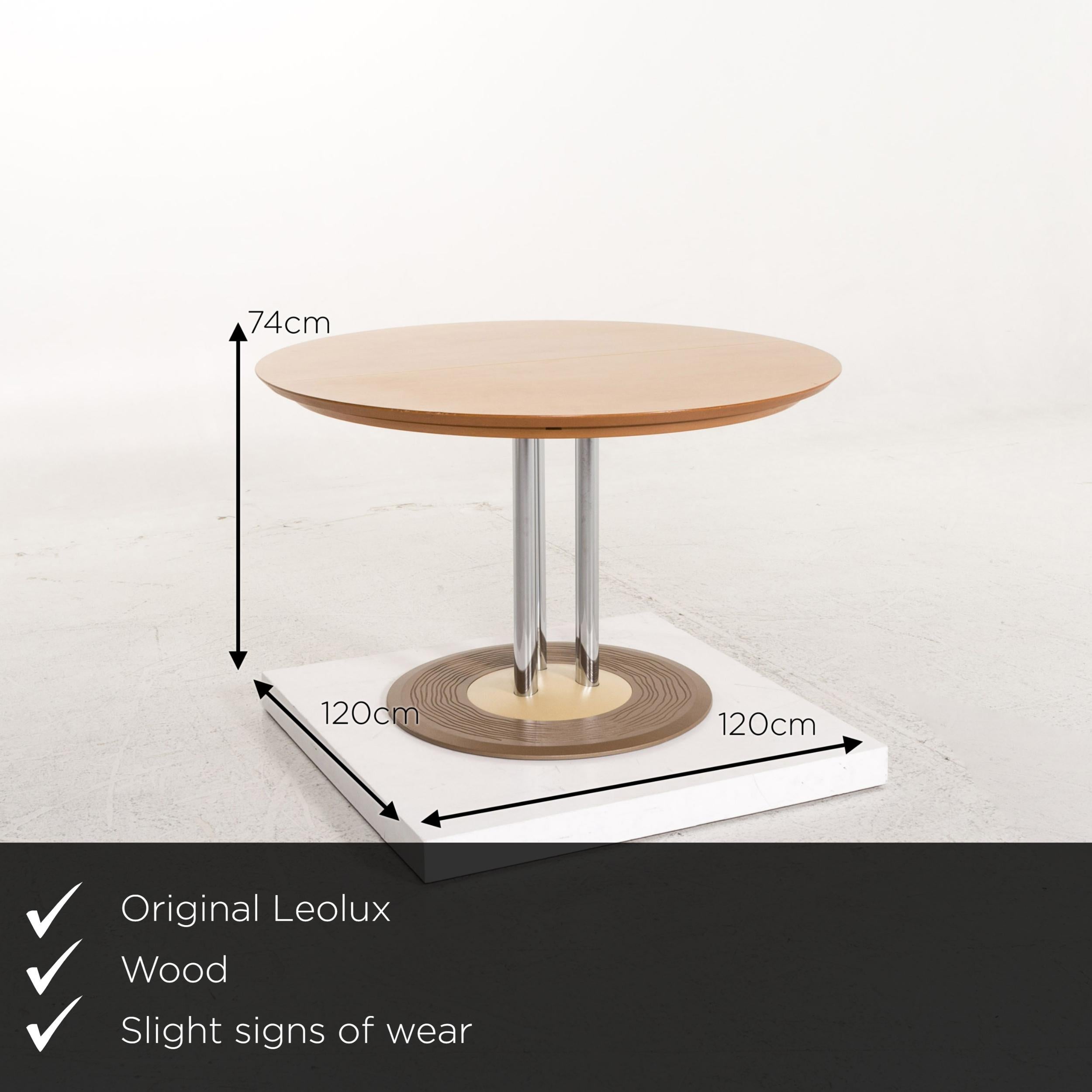 We present to you a Leolux Trias wooden dining table round extendable table.
 

 Product measurements in centimeters:
 

Ddepth 120
 Width 120
 Height 74.






 