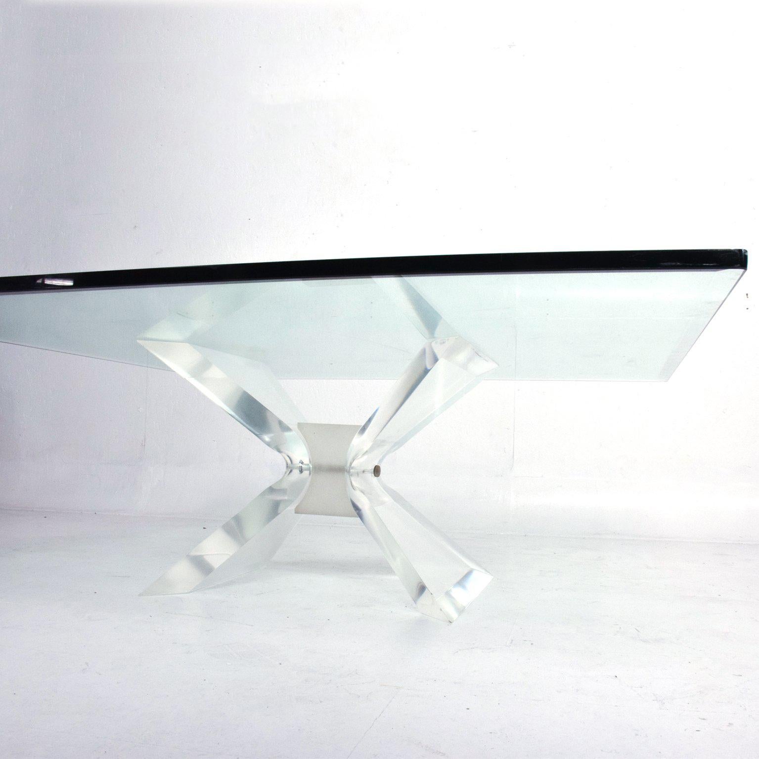 For your consideration: Lion in Frost Regency Coffee Table in Lucite and Glass by Leon Frost 1970s
Sculptural coffee table square cocktail table glass on sculptural X-form base.
Thick glass top.
41.75 x 41.75 x 16 tall.
Glass .75 thick.
Original