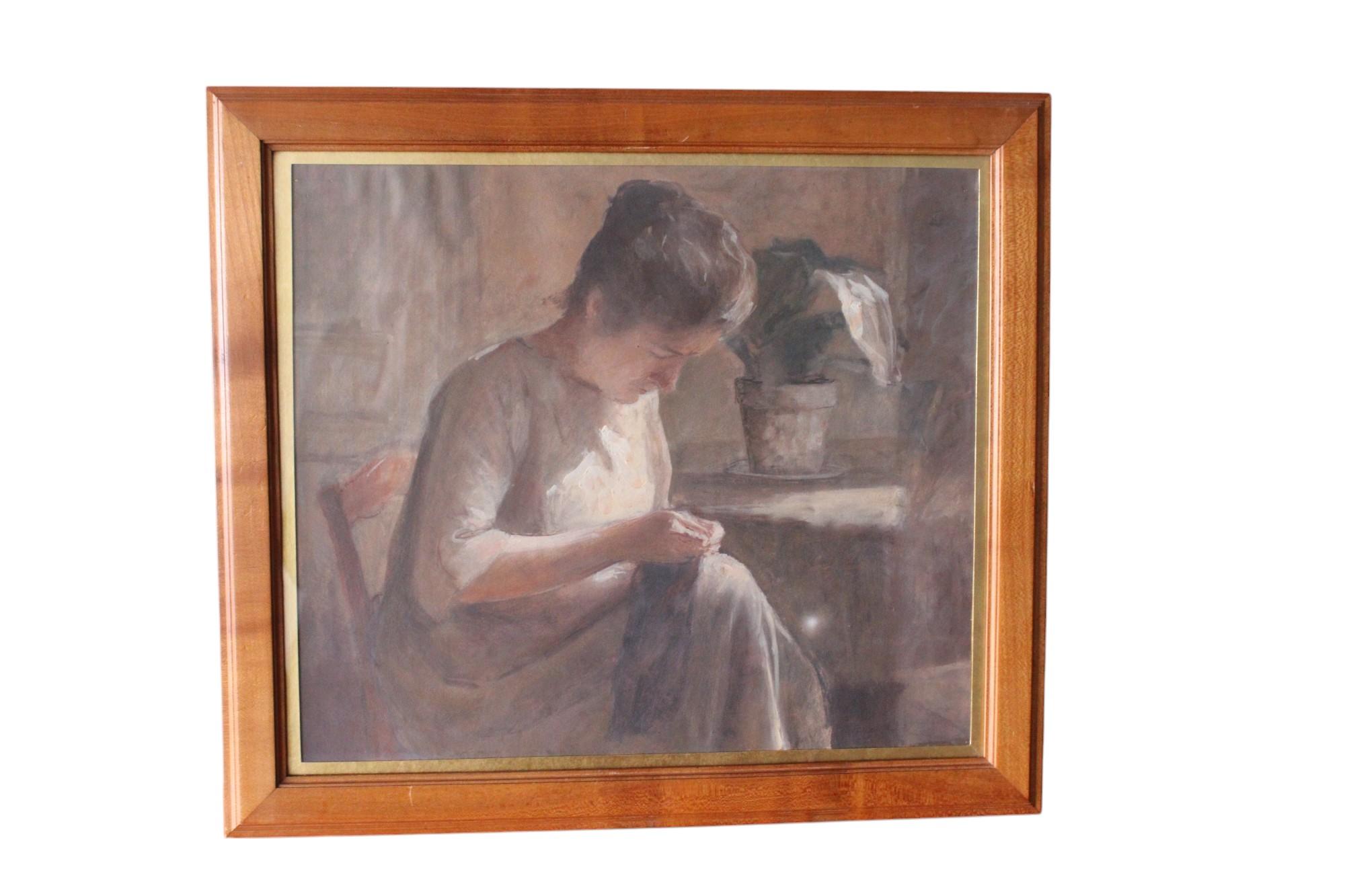 A quiet moment captured by the artist, Leon Garraud of a woman sewing.  It's an oil on board framed under glass in beautiful tones of browns and greys highlighed by the light shining on the woman's dress as she sits in the brightest part of the
