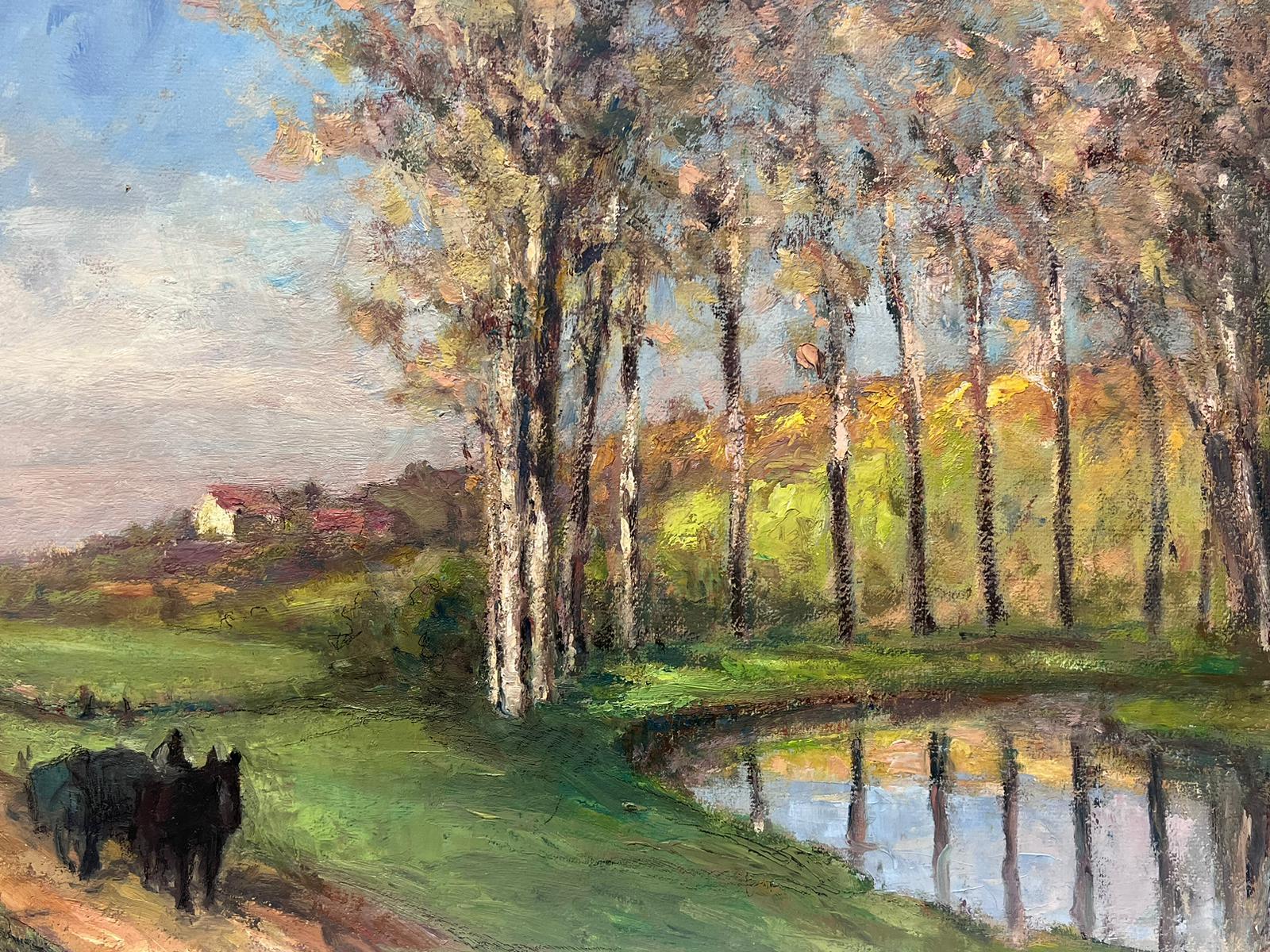 Peinture à l'huile française ancienne - Chevaux noirs se promenant autour d'une rivière éclairée - Painting de Leon Hatot