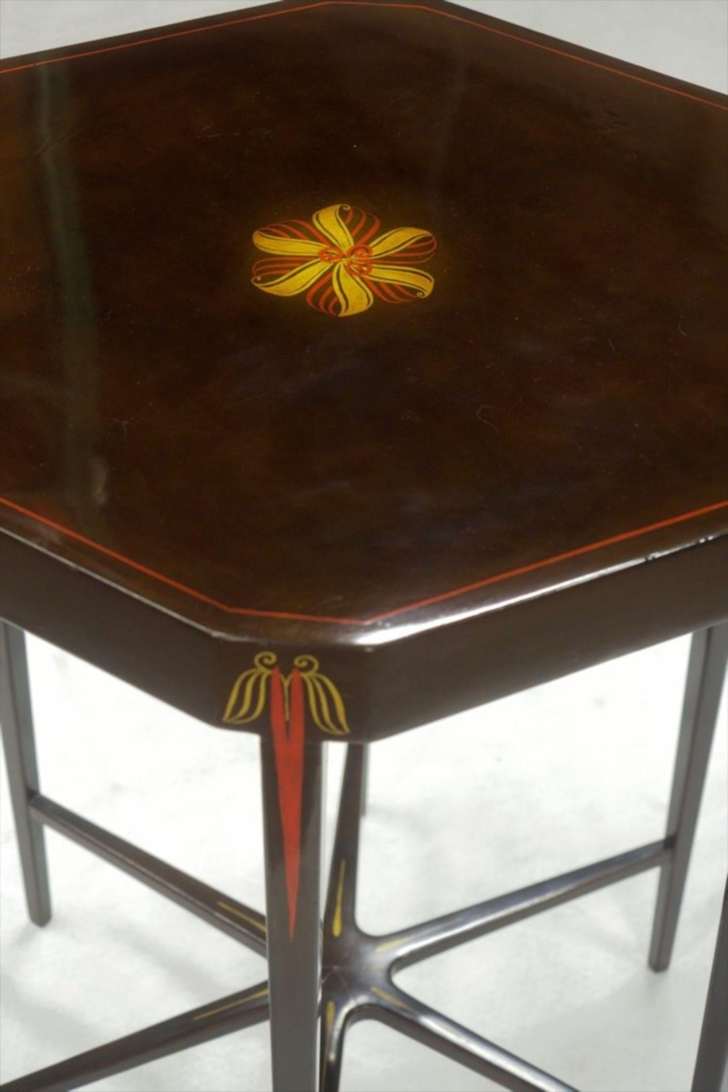 Early Classic French Art Deco side table, circa 1920. Original dark tobacco-colored lacquer with red and gold lacquer decoration. Measures: 23