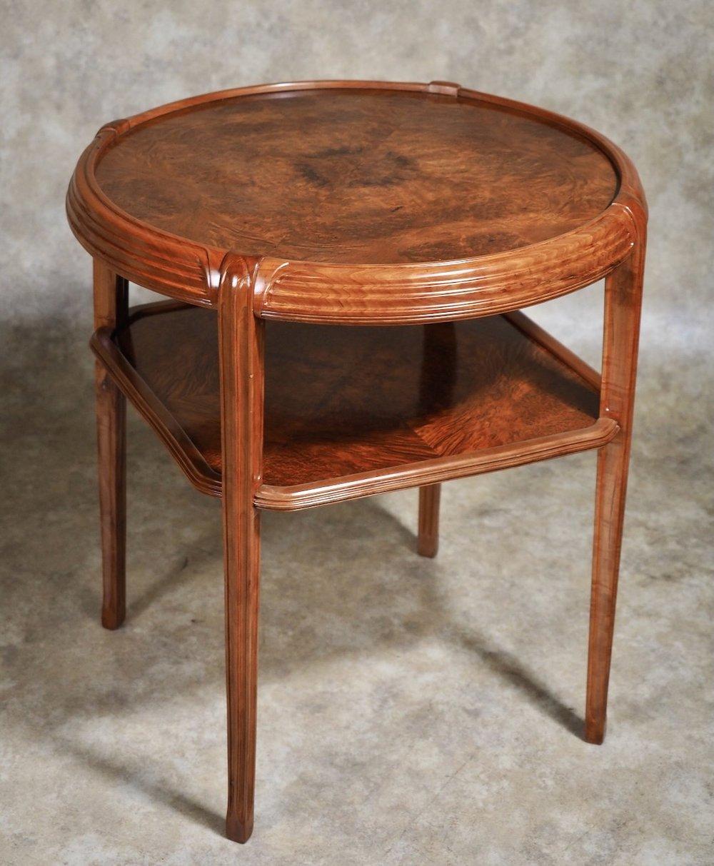 Early French Art Deco (transitional) tiered table by Leon Jallot in pearwood and camphor wood burl, circa 1910-12. 28” diameter x 29” high.

Leon Jallot (1874-1967)

Born in Nantes, July 24, 1874, Leon Jallot studied in Paris but did not go to