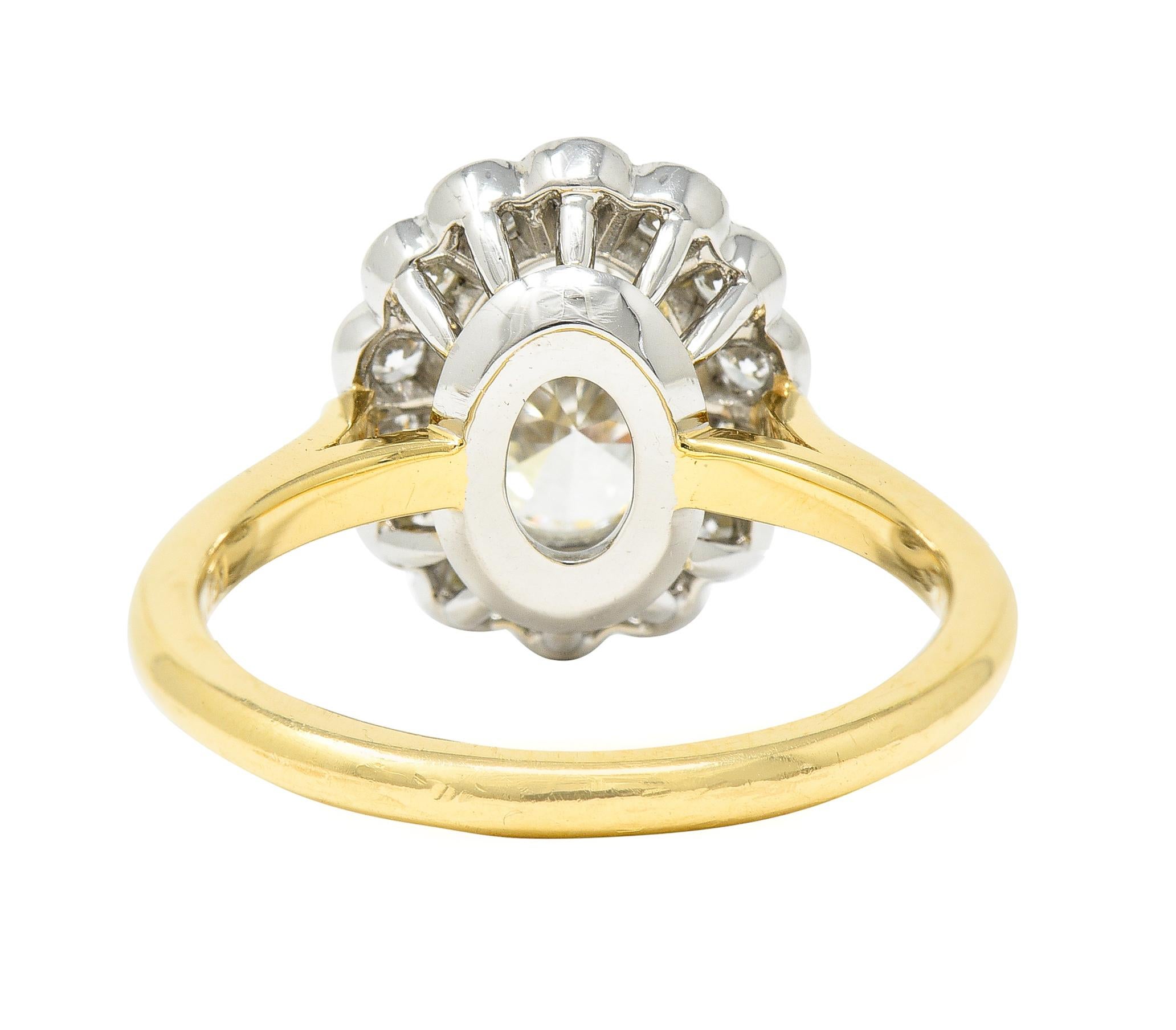 Contemporary Leon Megé 2.30 Carats Oval Cut Diamond Platinum 18 Karat Yellow Gold Halo Ring