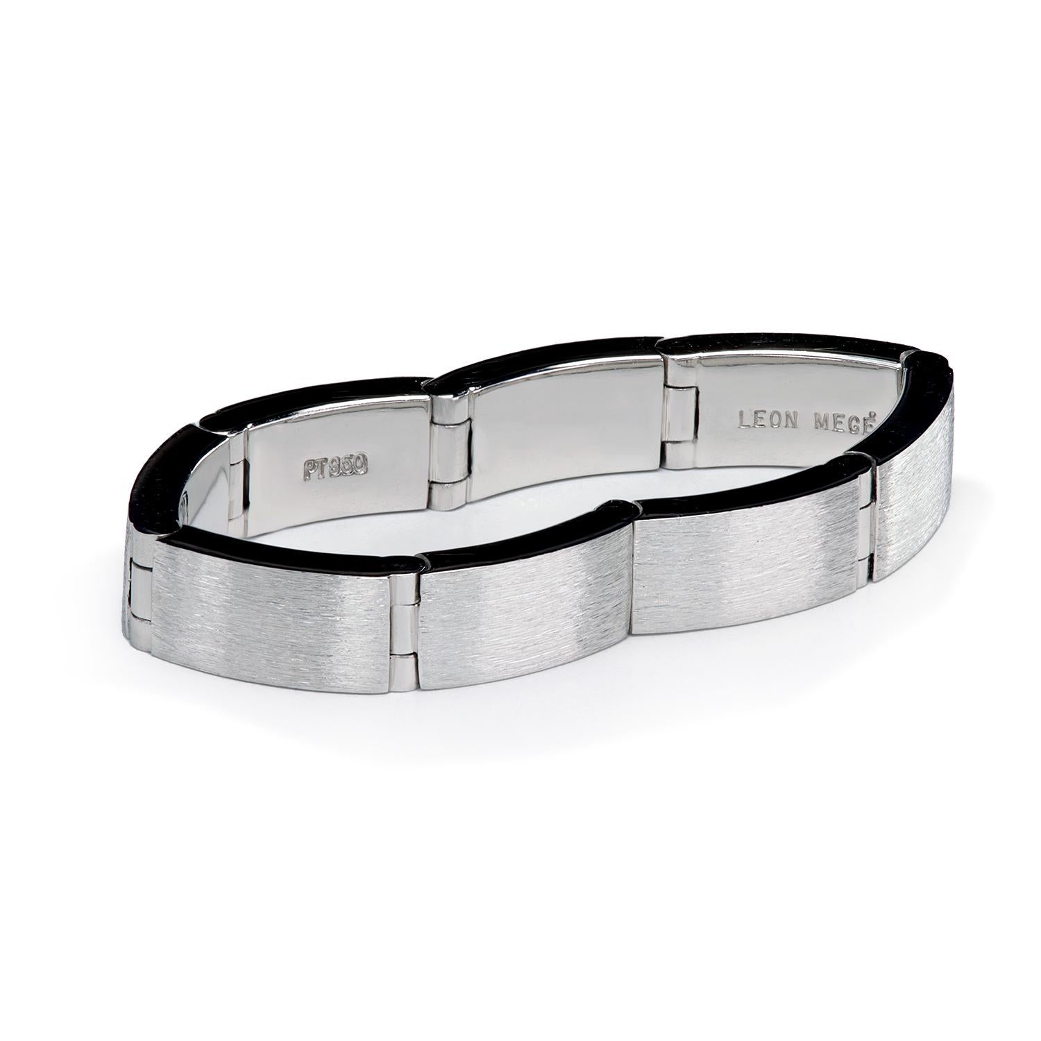 4 mm wide platinum flexible (hinged) band with brushed finish. 

Whether you wear this ring to a black tie dinner at the benefit for a disabled cat or to a biker's bar brawl, this ring will keep your wedding finger in a feather-like soft comfort.
