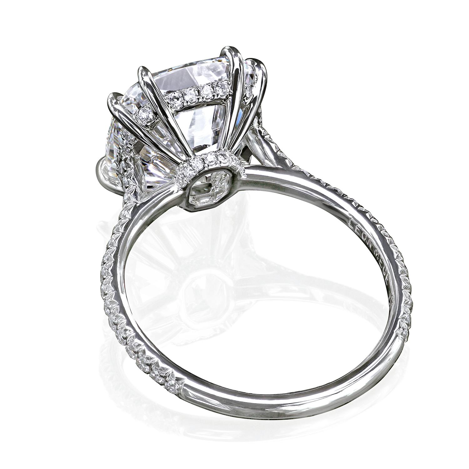 Solitaire engagement ring featuring a True Antique cushion cut diamond at the center.
The timeless design is completed with micro pave diamonds on the basket holding the diamond and cathedral shank.
Hand-forged platinum
The ring has not been made