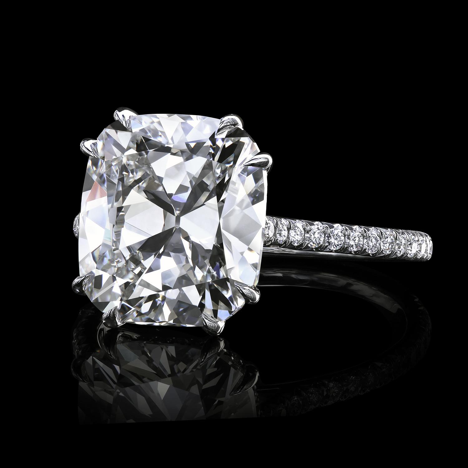 Solitaire engagement ring featuring a True Antique cushion cut diamond at the center.
The timeless design is completed with micro pave diamonds on the basket holding the diamond and cathedral shank.
Hand-forged platinum
The ring has not been made