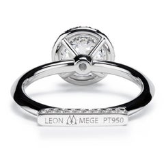 Leon Megé Daytona engagement ring with a round diamond and pave-set podium base