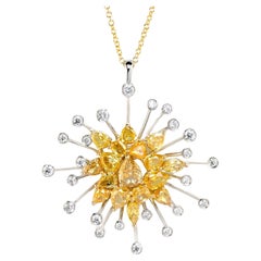 Leon Mege "Dream of Infinity" gold pendant with yellow and white diamonds.