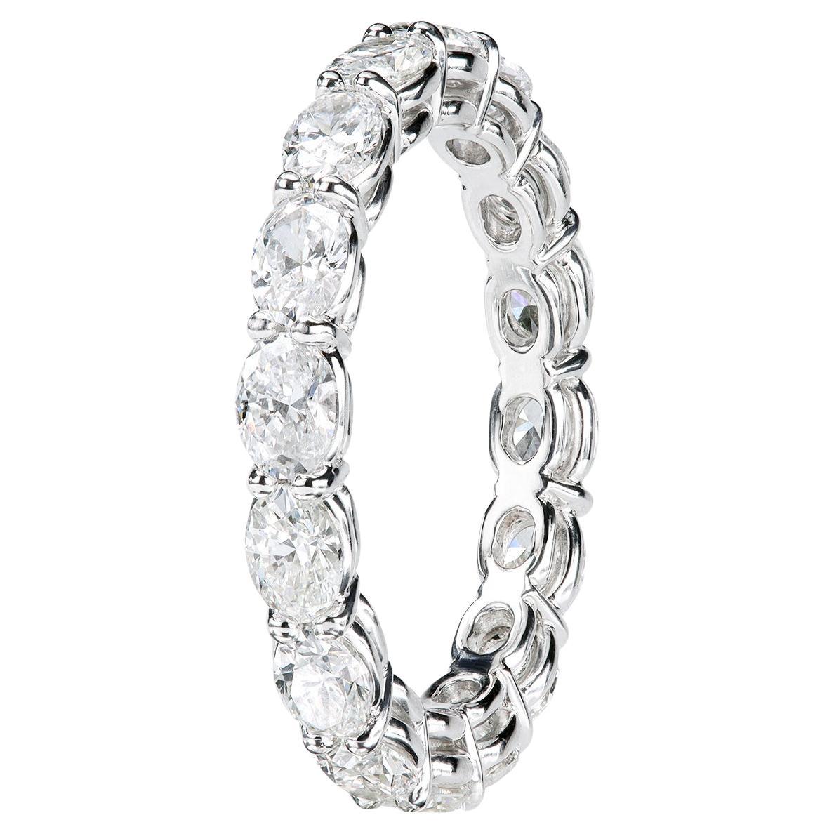 Leon Megé bespoke East-West oval diamonds eternity band 
16 natural oval F/VS diamonds
2.30 carats total weight
3.10 mm width
Shared-prongs
Rolex-grade platinum
Size: 6