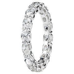 Used Leon Megé East-West  bespoke platinum eternity band with natural oval diamonds