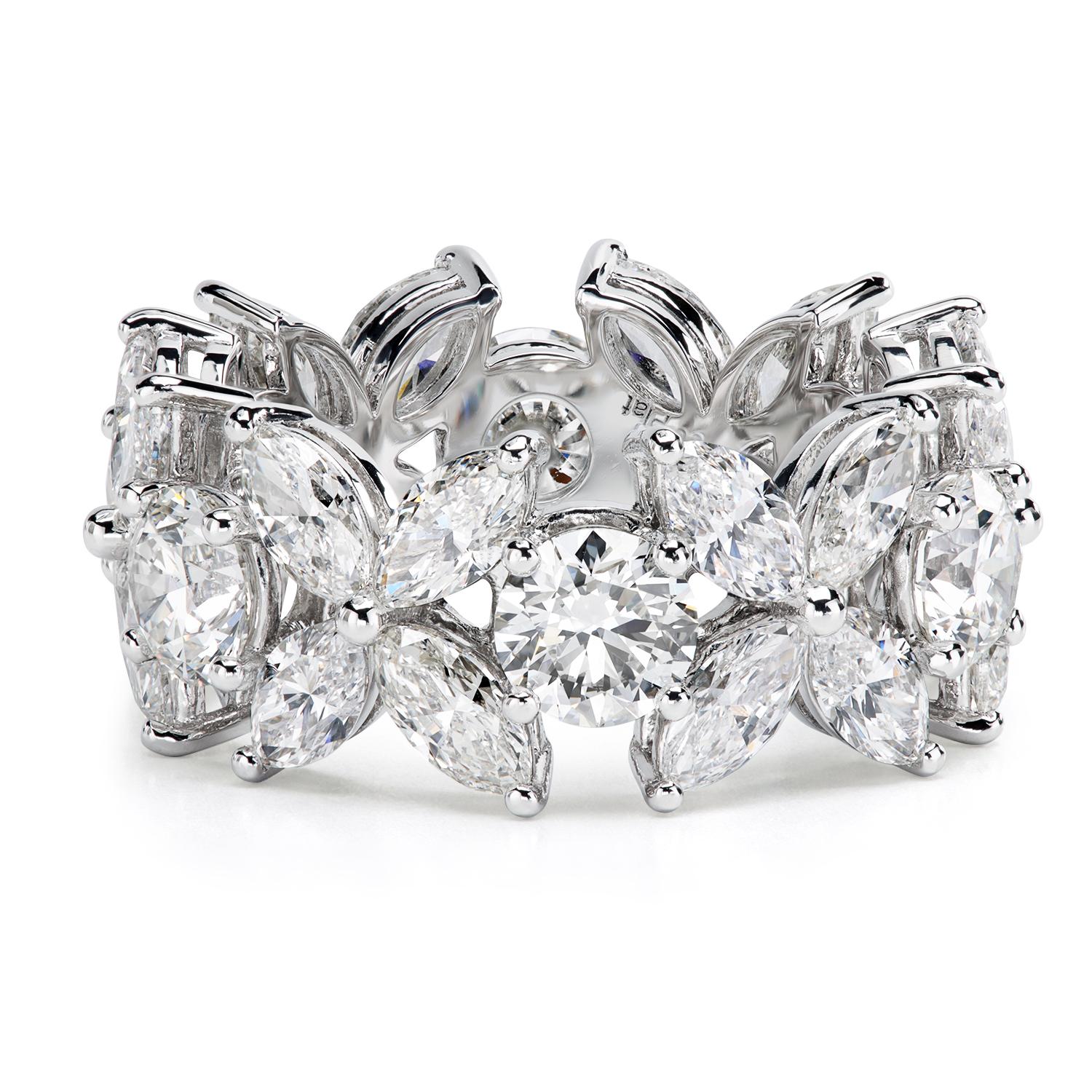 Gorgeous eternity band of alternating round diamonds and Florette marquise clusters by the famed New York jeweler and Avant Garde artist Leon Mege. 
All diamonds are G/VS; the total weight is approximately 6.00 ctw. Round diamonds are approximately