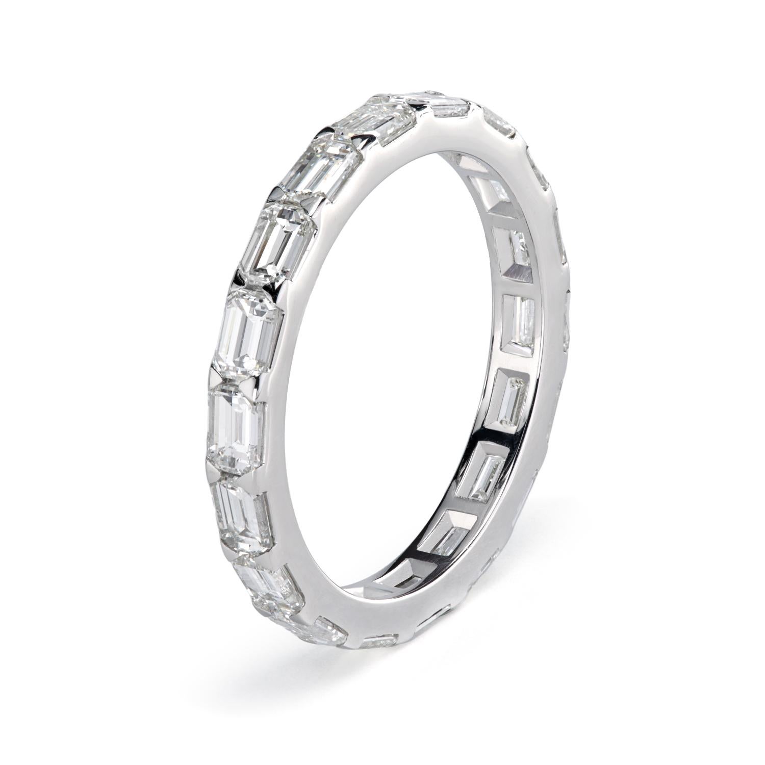 Leon Mege vaunted Hamptons™ platinum eternity band set East-West with emerald-cut diamonds. The style epitomizes the highest perfection in the field of bridal couture, where standards of quality are so high, but the standards of artistry are even