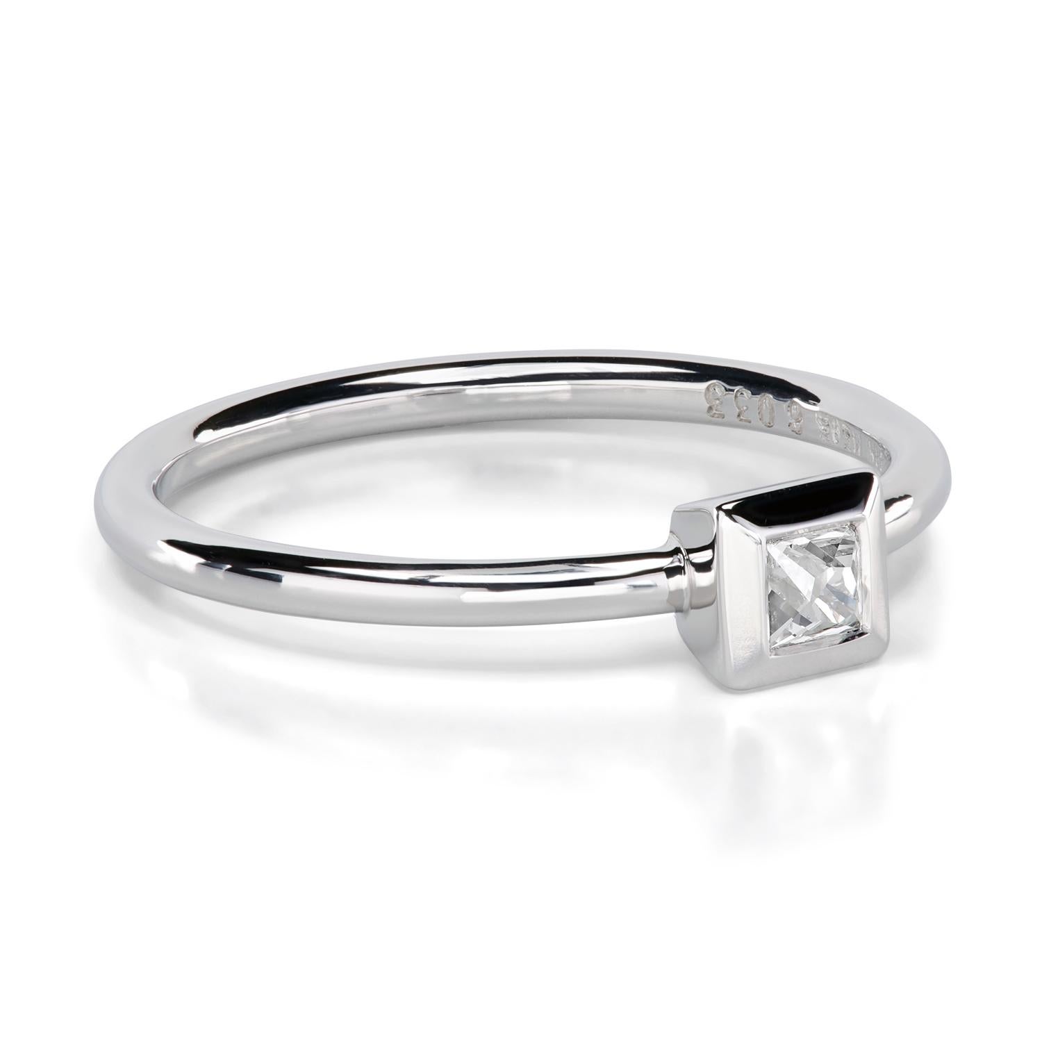 Super cute ring with a small but mighty 0.11-carat French cut diamond designed for those with good taste but still burdened with student loans. This little gem of a ring is made of platinum, and it will get you through the day if you glance at your