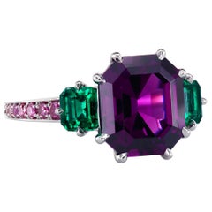Leon Mege GIA Certified Purple Garnet with Emeralds Platinum Three-Stone Ring