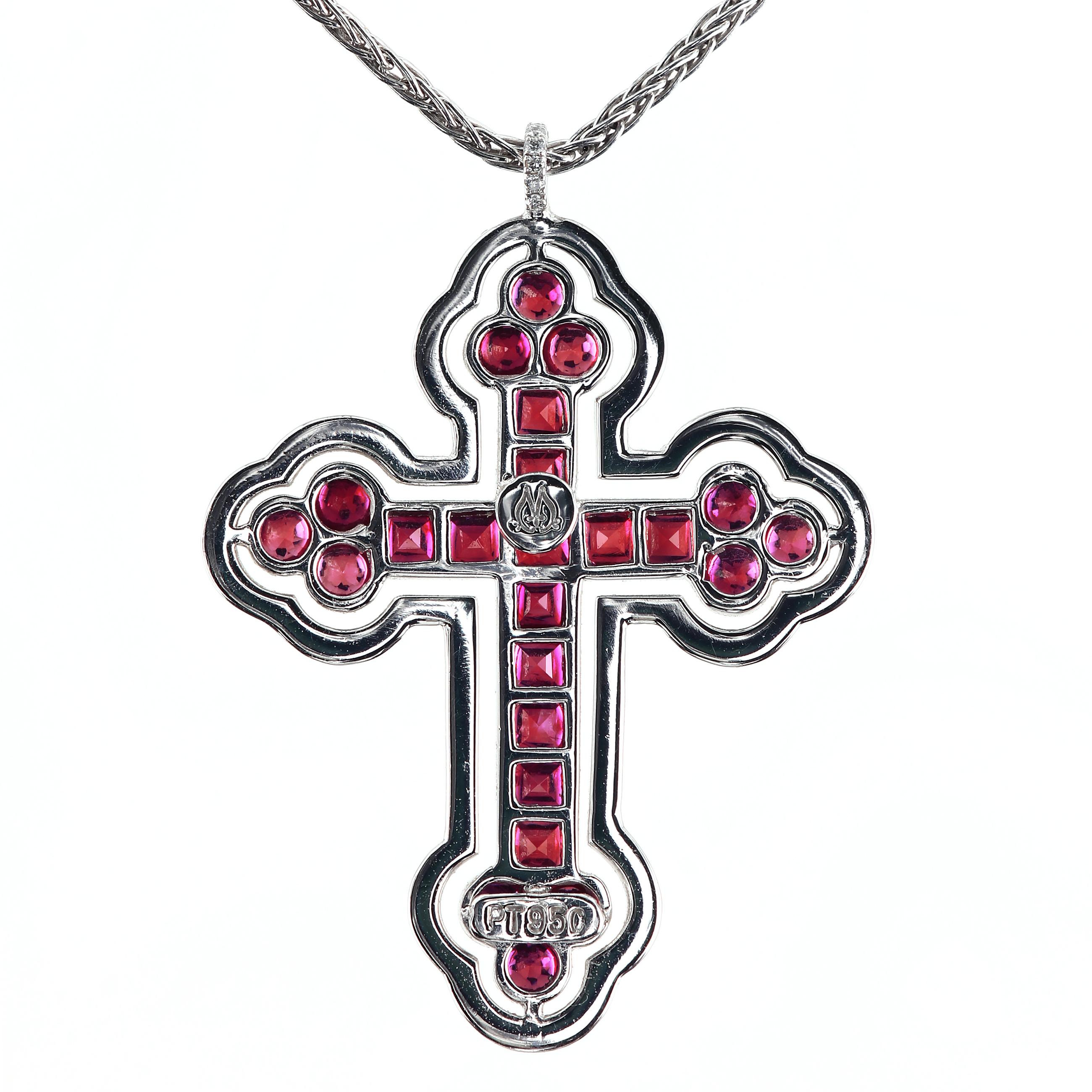 Channel-set buffed top rubies and white diamonds adorn the bespoke Greek Orthodox Cross. 
24 square and round buffed-top natural rubies total of 1.25 carat
98 full-cut diamonds 0.70 ctw
18