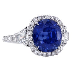 Leon Mege Halo Platinum Three-stone Ring with Certified Blue Cushion Sapphire 