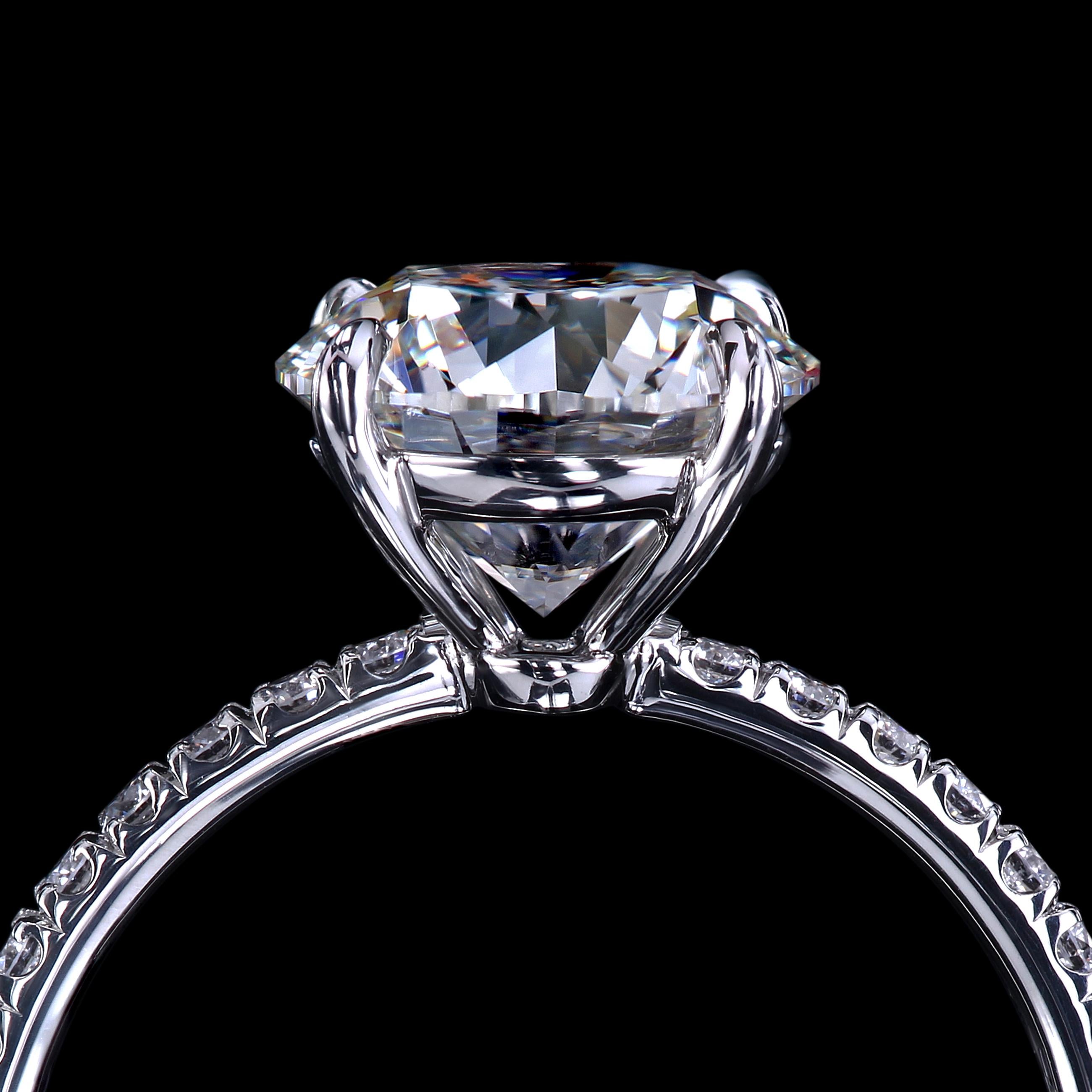 The perfect solitaire ring custom-crafted by hand. The shank is set with one row of micro pave. 
You can choose the width of the shank between 1.5 and 2.0 mm.

The lead time for project completion is approximately four weeks.

Custom made pieces are