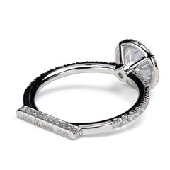 Leon Mege "Jesolo" platinum halo engagement ring with natural round diamond