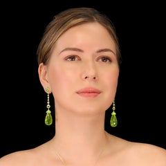 Leon Mege long drop earrings with green amber tsavorite, garnet and moonstones