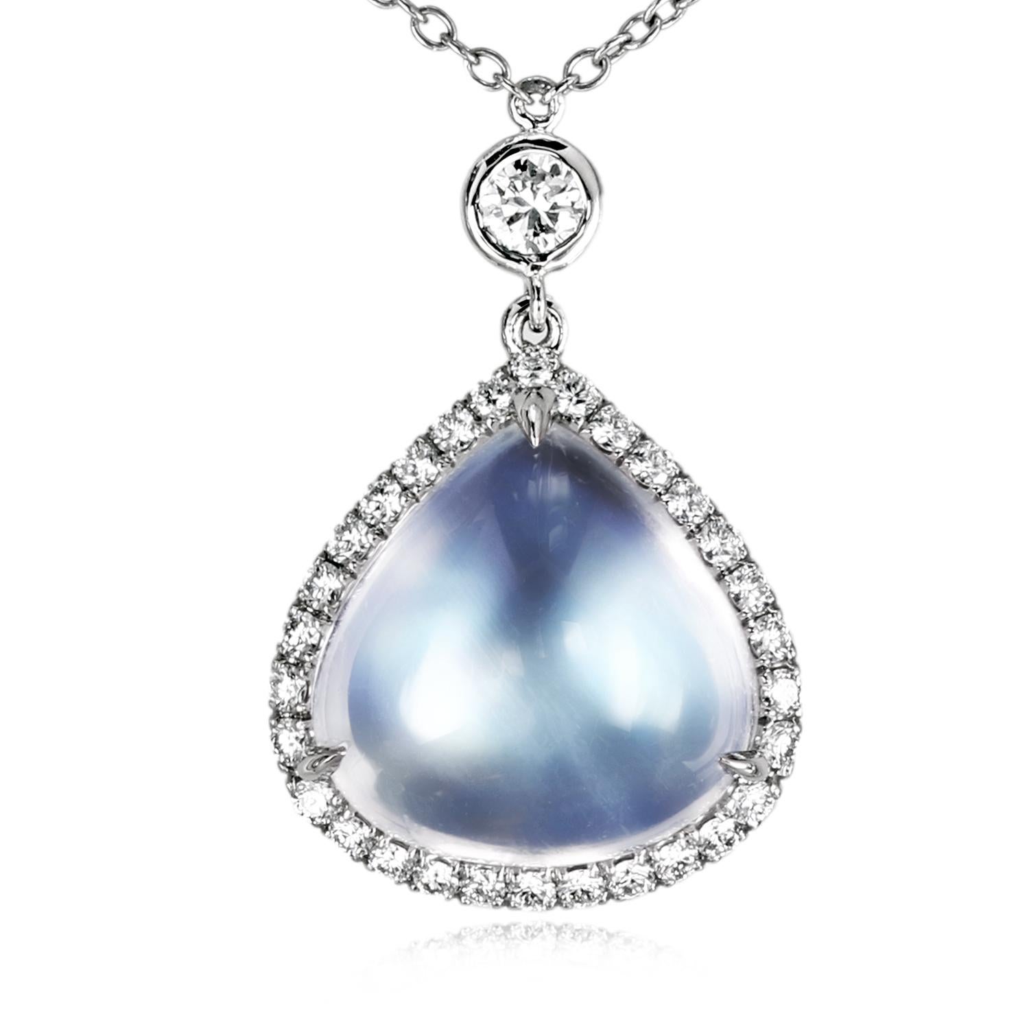 Leon Mege moonstone pendant is the ultimate embodiment of timeless glamour and unsurpassable style. This exquisite jewel features a natural 5.35-carat blue moonstone in a delicate micro pave halo of remarkable fire and brilliance. 
The must-have