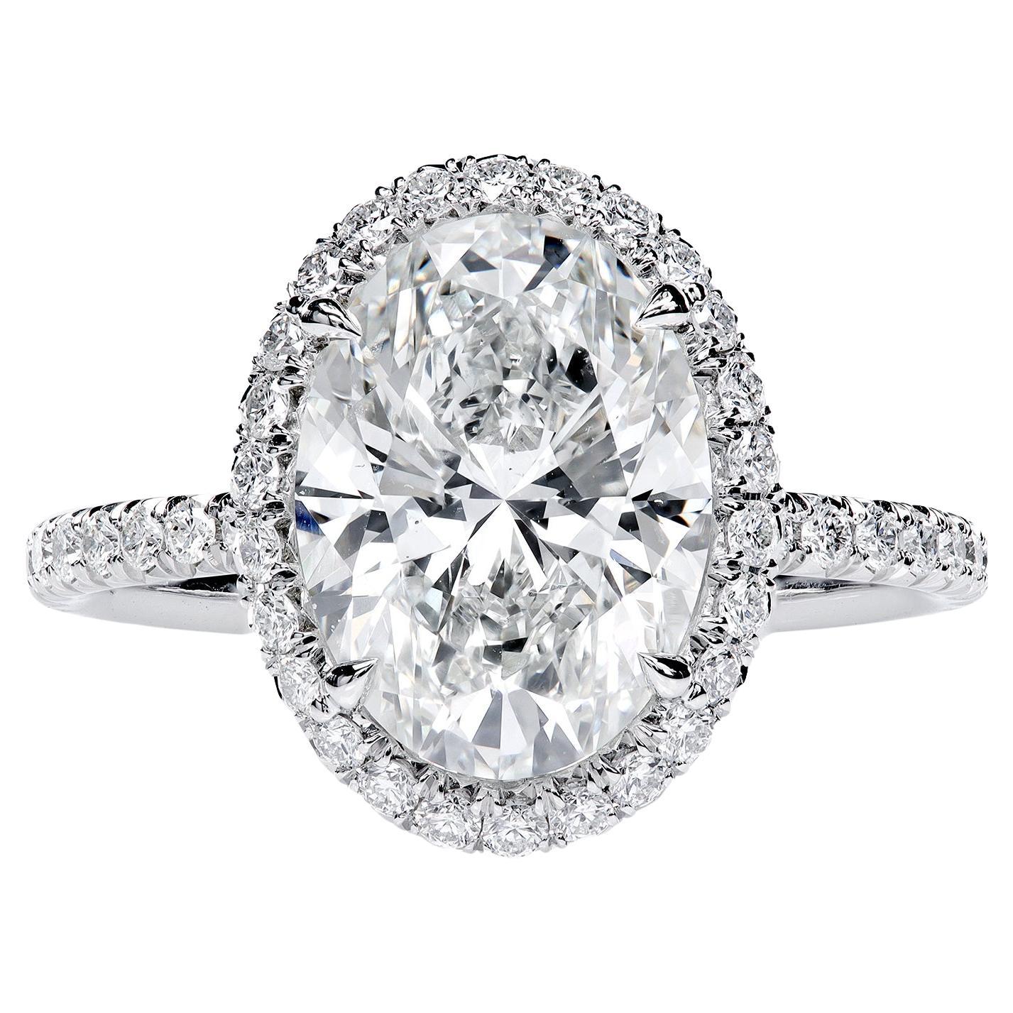 Leon Mege perfekter ovaler Halo-Ring mit zertifiziertem natürlichem ovalem Diamanten im Angebot