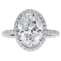 Leon Mege perfect oval halo ring with certified natural oval diamond