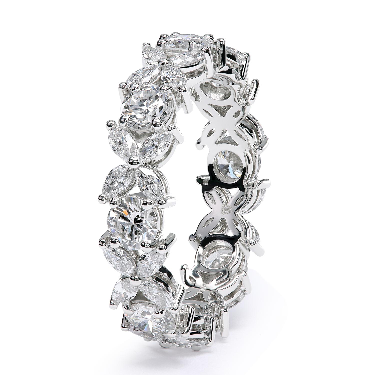 The eternity wedding band with round diamonds alternating with marquise clusters in our iconic double-tiered precision-forged wirework. 
Set with natural diamonds. As a result, size, carat weight and stone qualities can vary slightly from one to