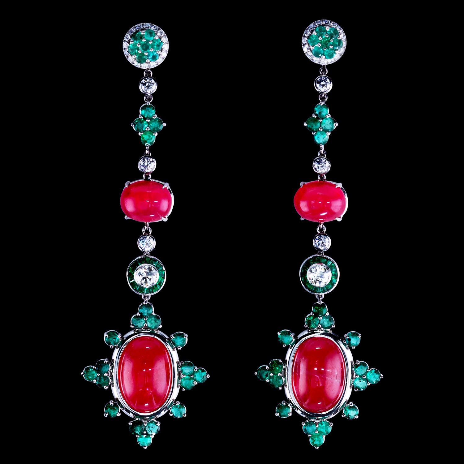 The Arcata's design consists of radiating elements surrounding the centerpiece. The studs can be separated to be worn with, or, without the long pendants.
Made with collector-grade gem Rhodonites, Colombian emeralds, and old-cut diamonds the