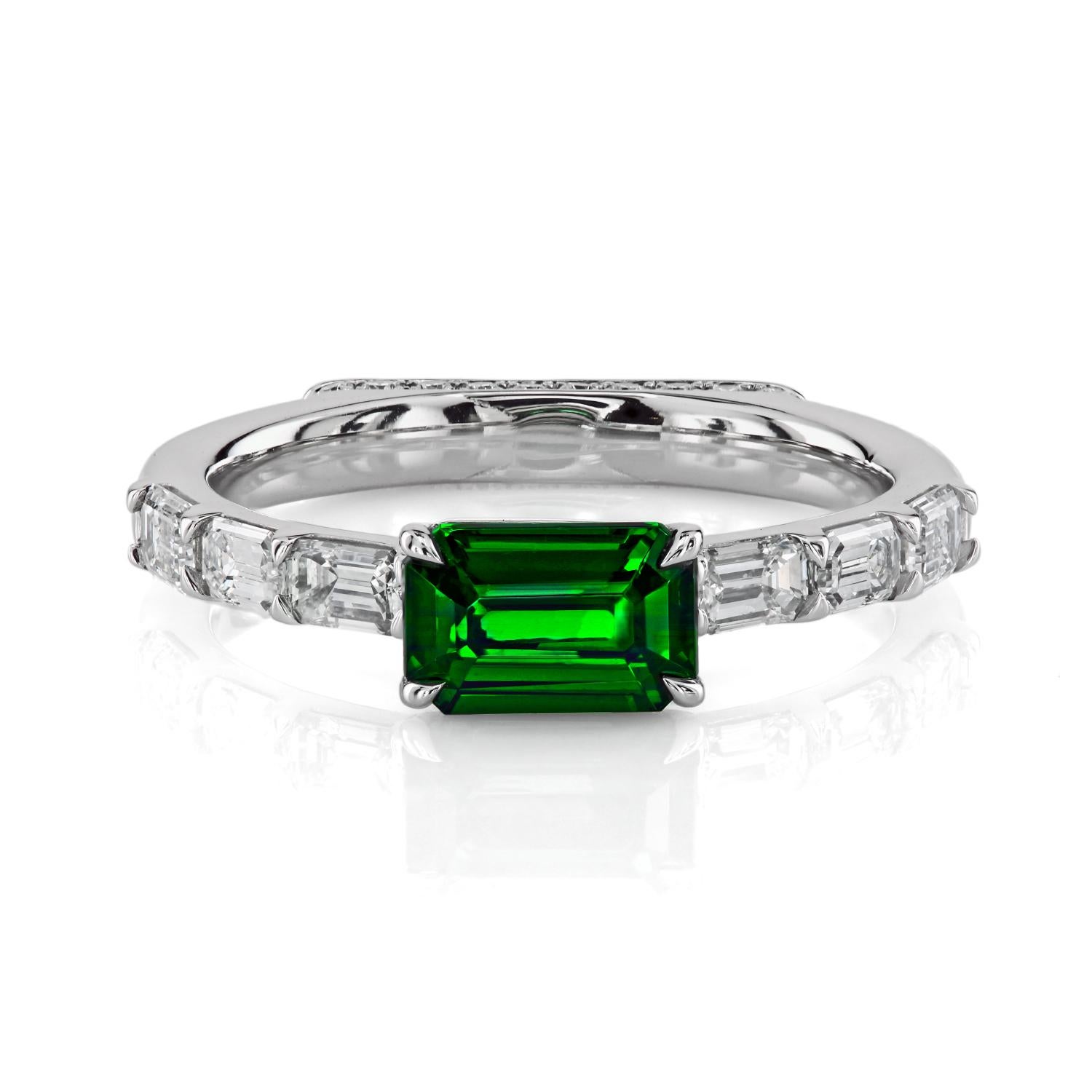 Beauty comes in diverse shapes and sizes. So do Leon Mege's colorful right-hand platinum rings set with a rainbow of colorful natural gemstones. This beautiful combination of a natural tsavorite and emerald-cut diamonds in a reversible East-West