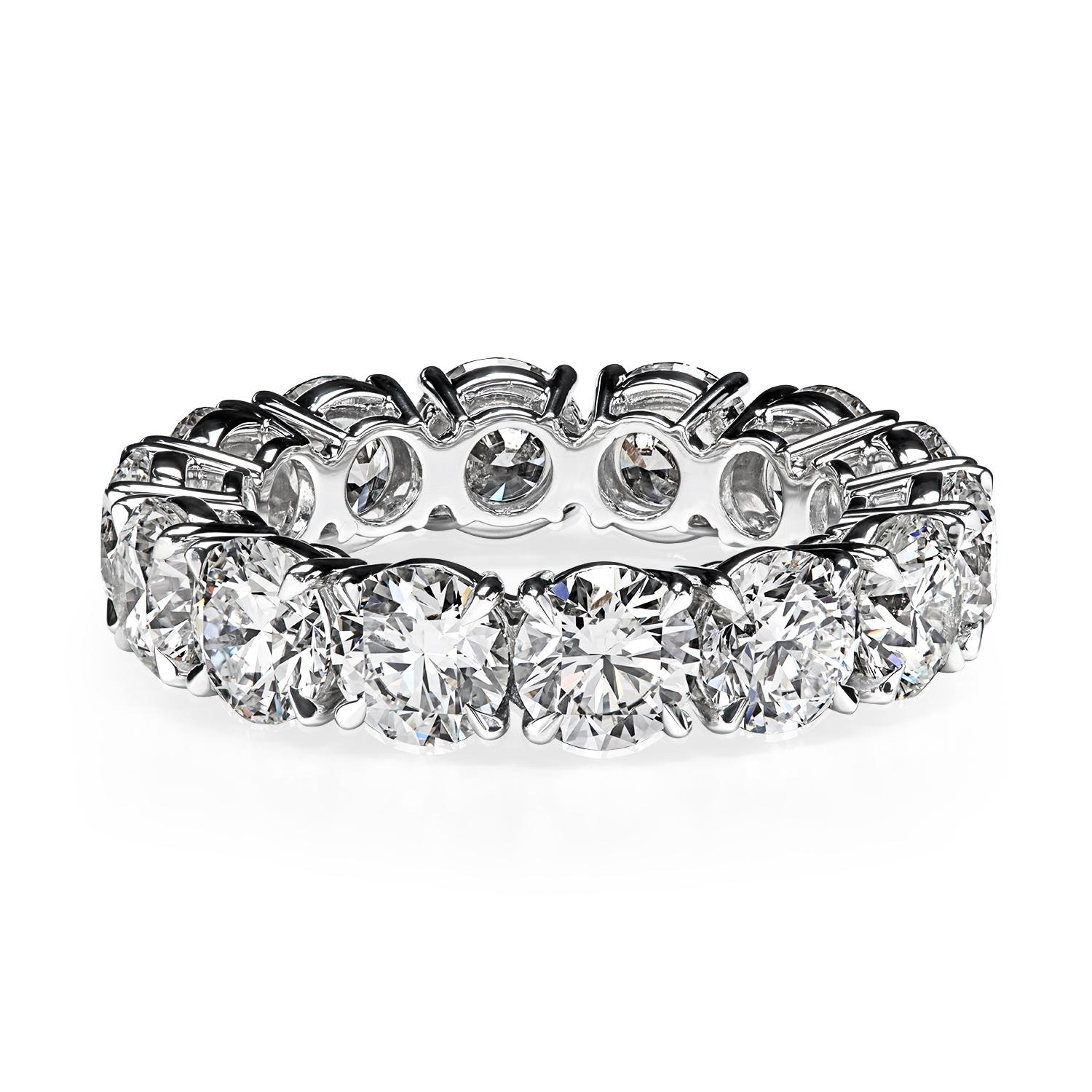 Handmade eternity band with round diamonds by the famed New York jeweler and Avant Garde artist Leon Mege.
The 4-prong style eternity bands are popularized by Cartier and offer extra security and upscale charm.

The eternity band will be hand-forged