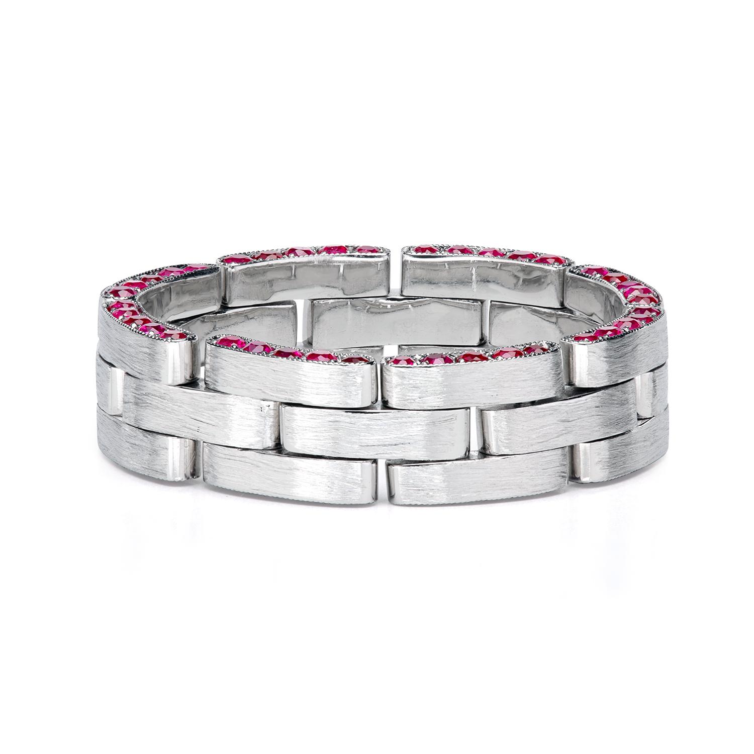 We infused the unisex wedding band with natural rubies on the sides of the wedding band. finger. The band is flexible and feels soft on a finger due to its hinged construction.
Width 6.8 mm
80 rubies 0.90 ctw
Finger size: 11
Rolex-grade