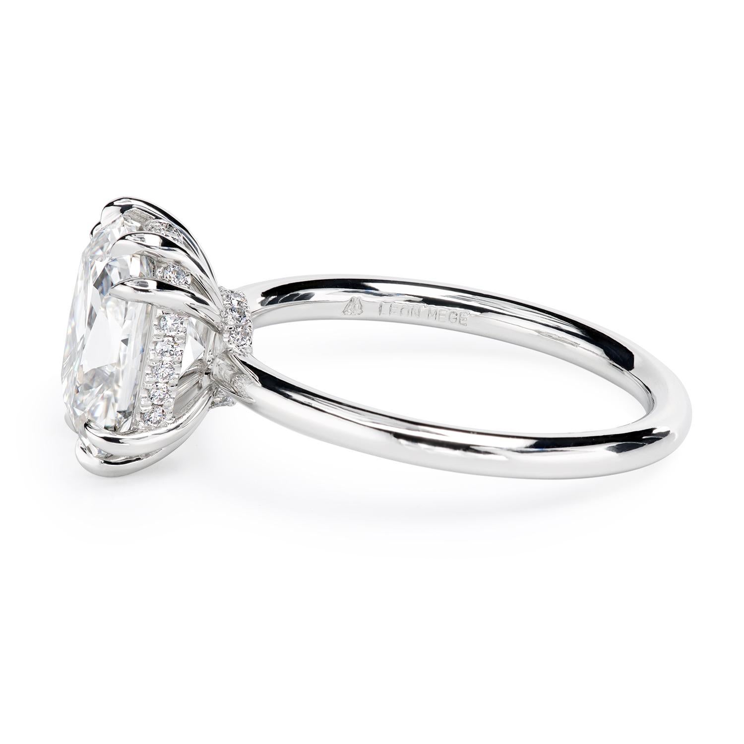 Contemporary Leon Mege platinum hand-forged solitaire features a certified OMC diamond. For Sale