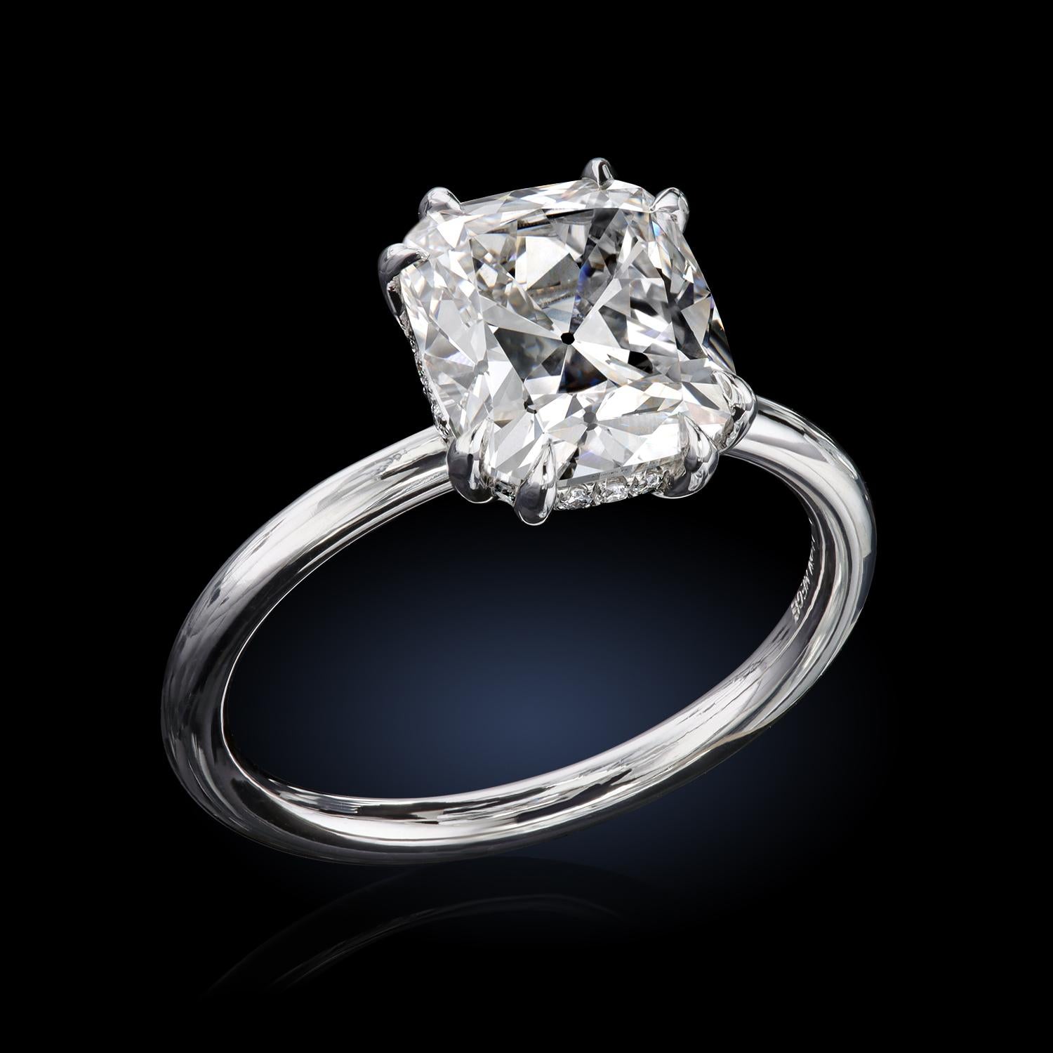 Women's Leon Mege platinum hand-forged solitaire features a certified OMC diamond. For Sale