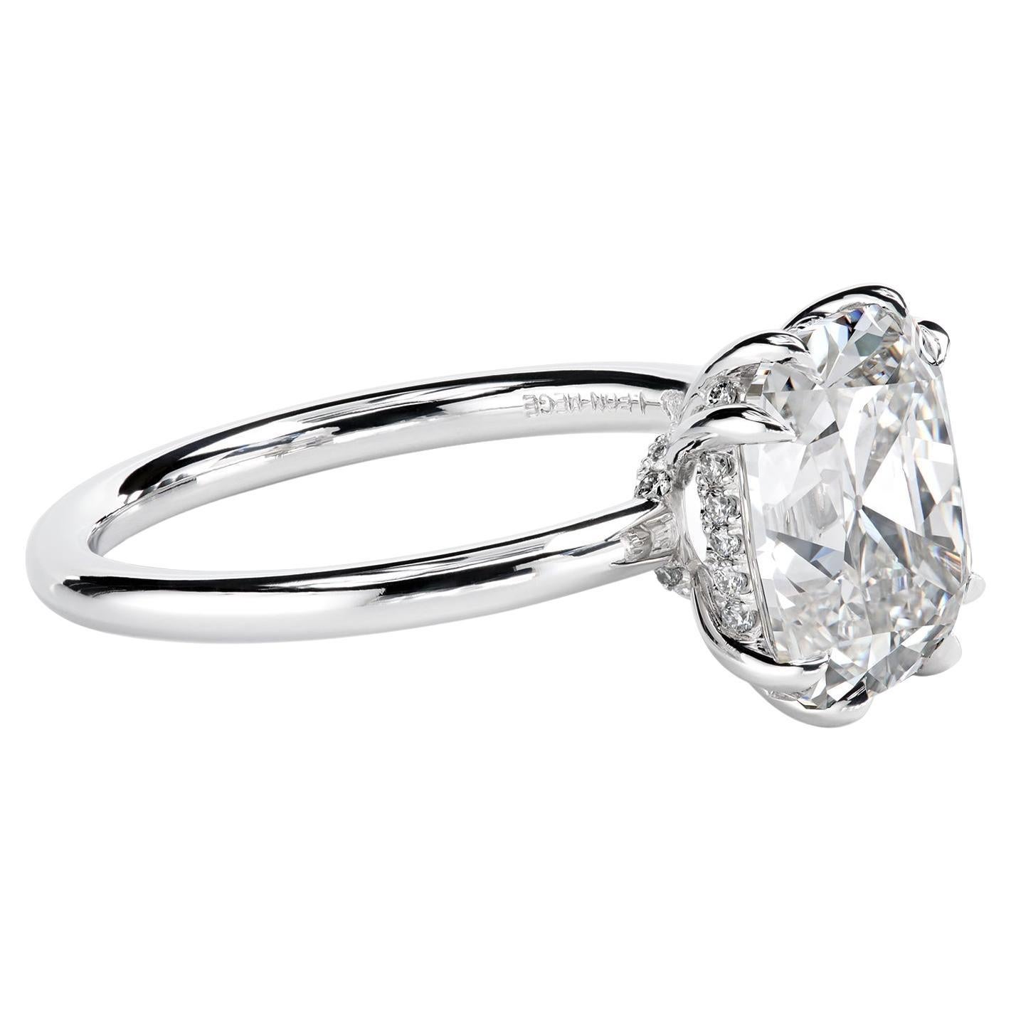Leon Mege platinum hand-forged solitaire features a certified OMC diamond.