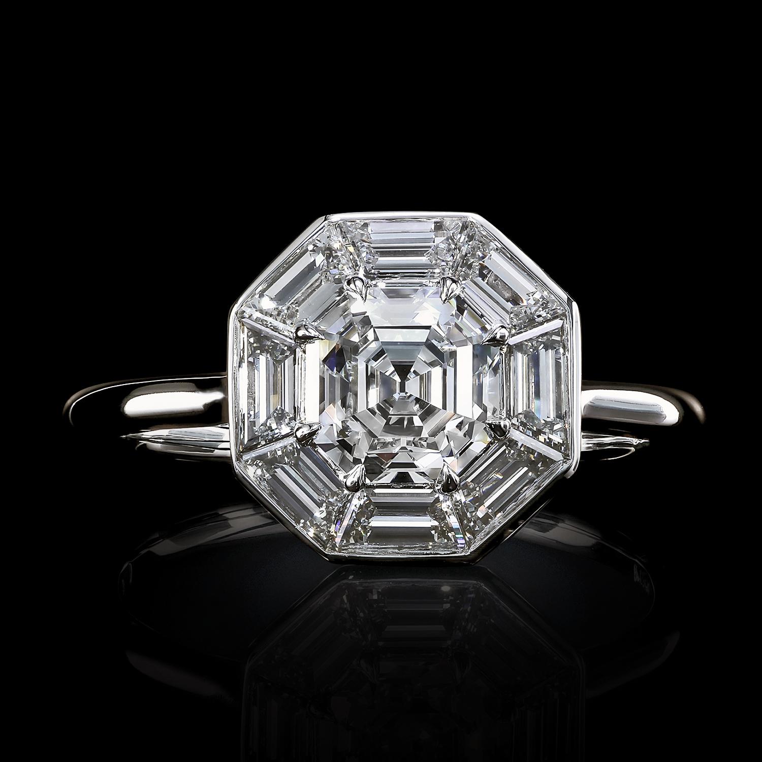 Brilliance is captured and serves a light sentence inside the stunning Asscher, extended with step-cut trapezoids on all sides. The ring's head is sealed in a skinny octagonal bezel on the slim arms of the elegant and very thin band.

Stunning True