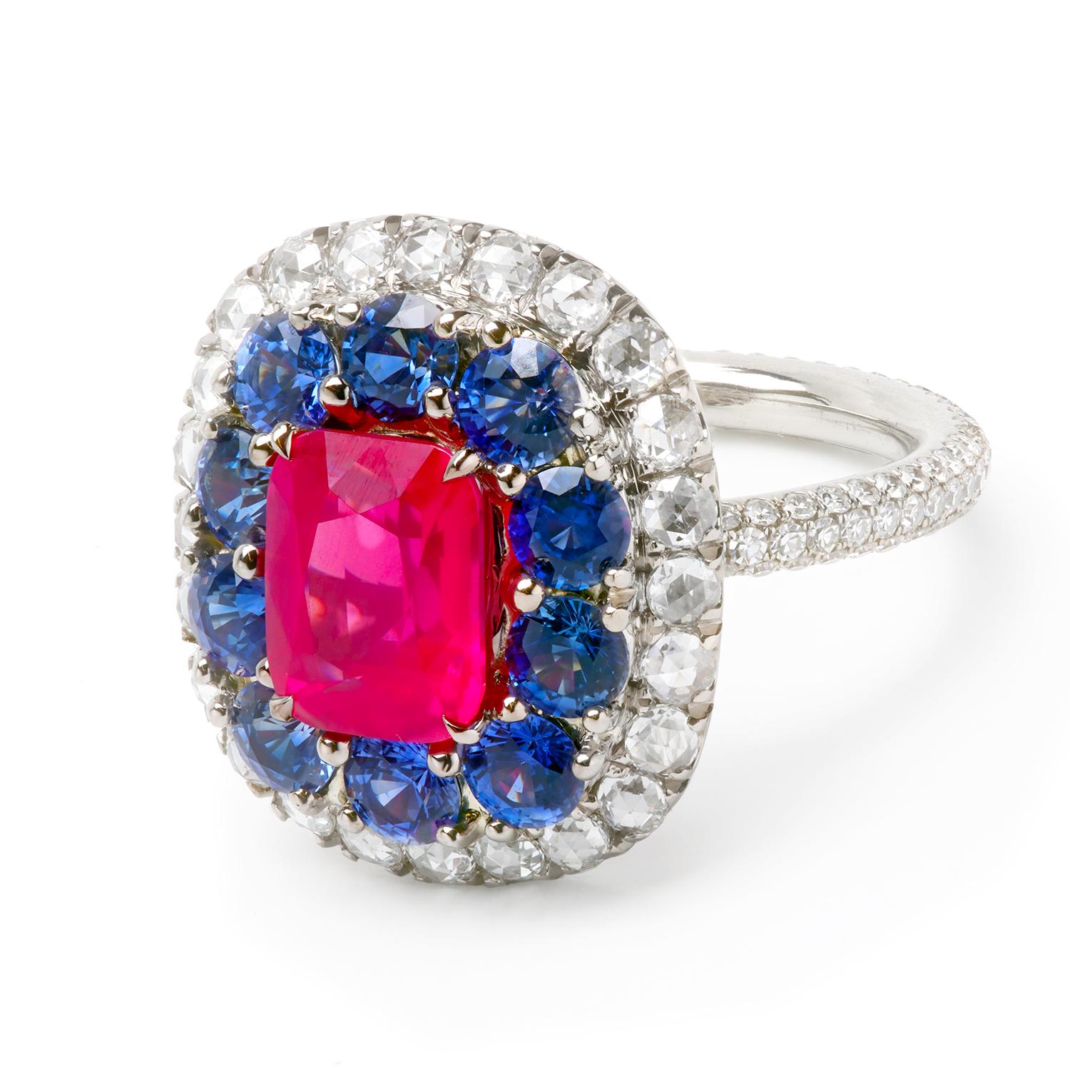 What makes any couture piece iconic is its beautiful, groundbreaking and inspirational look, like the Leon Mege Strawberry spinel and sapphire ring. 
Artistically set 2.30 carat certified natural milky-red spinel in surrounded by cornflower-blue