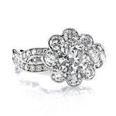 Anello Leon Mege con anello a raggiera smerlata e diamante vecchio taglio europeo in platino