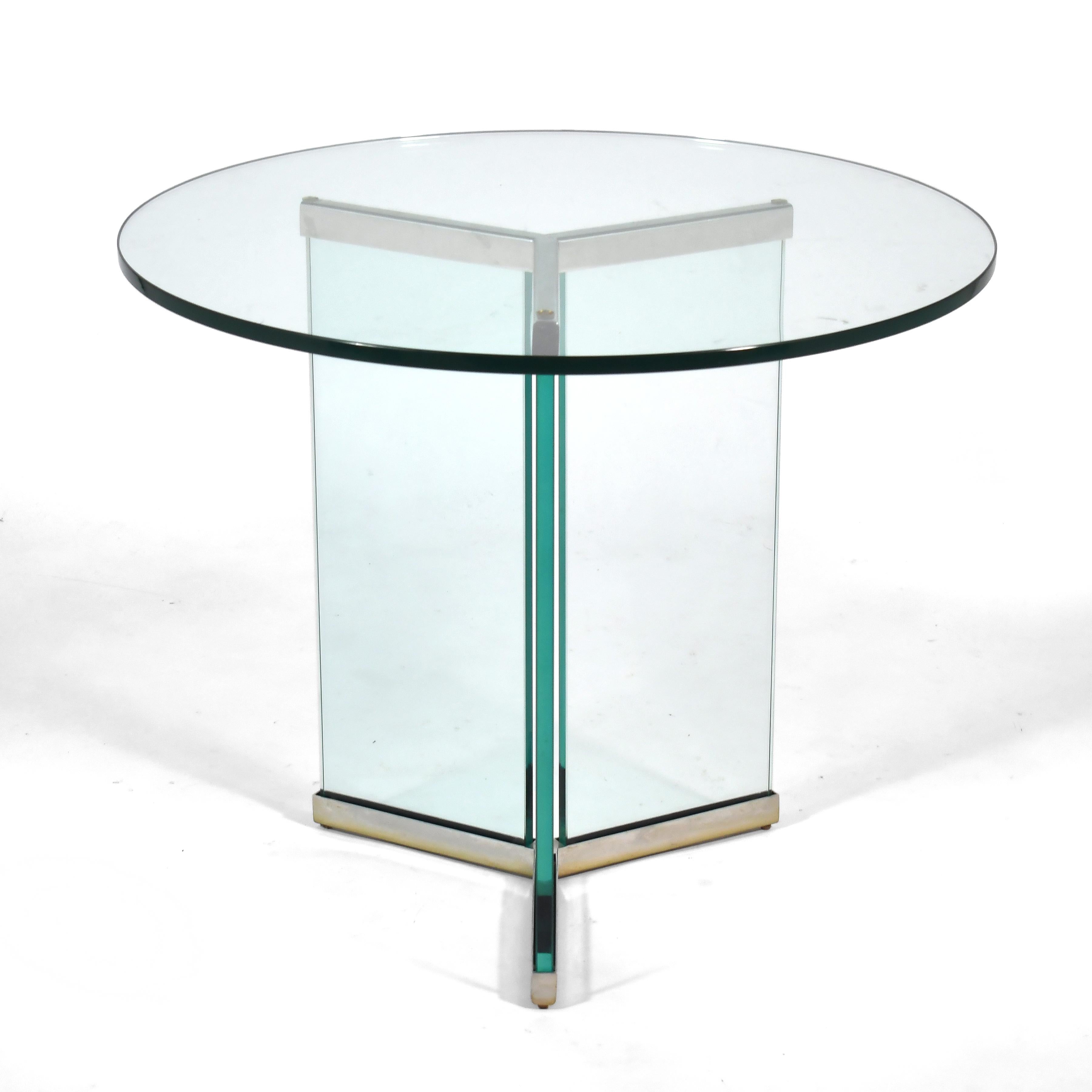This elegant design by Leon Rosen for Pace has a base of glass, three .75