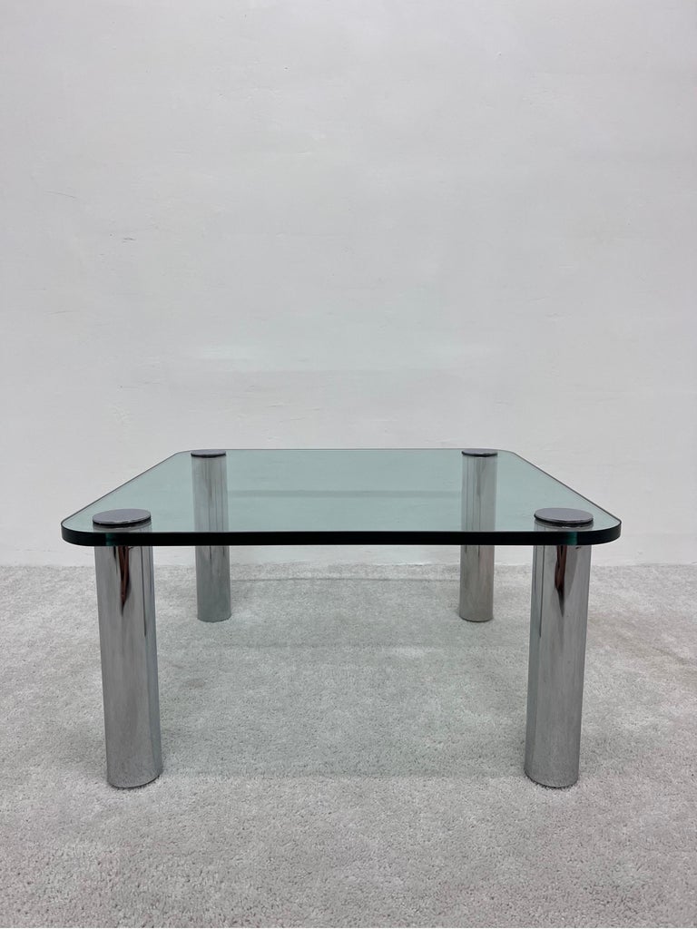 Side or petit coffee table with tubular chrome legs and a 3/4