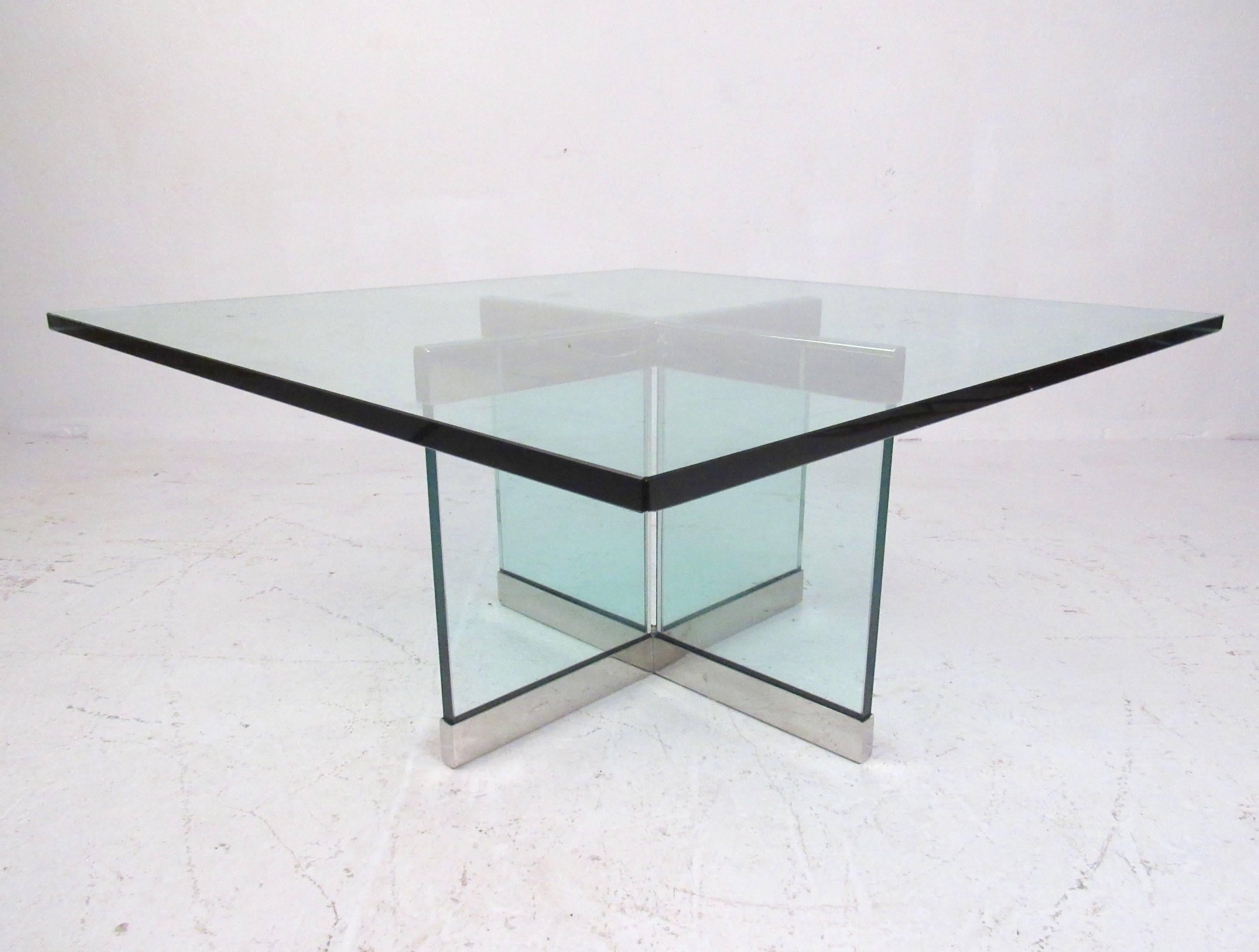 This unique modern coffee table by Leon Rosen for Pace furniture features stylish steel chrome and bevelled glass coffee table base with a 3/4 inch glass top. Impressive Mid-Century Modern cocktail table makes a substantial addition to home or